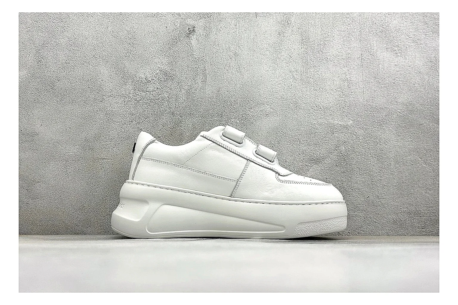 Acne Studios Velcro White Mid-Top shopping brief image showing white leather panels, broad hook-and-loop straps, padded mid-top collar, and a clean rubber sole thumbnail 4
