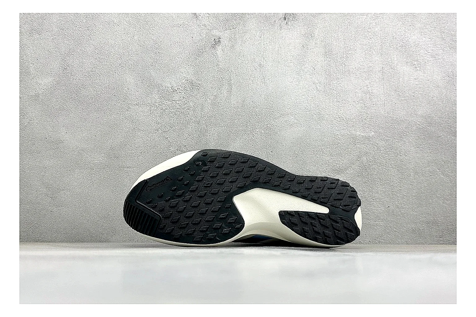 Adidas Adizero Evo Black shopping brief photo showing black racing upper, sculpted white sole, Adidas striping, and lightweight performance silhouette thumbnail 2