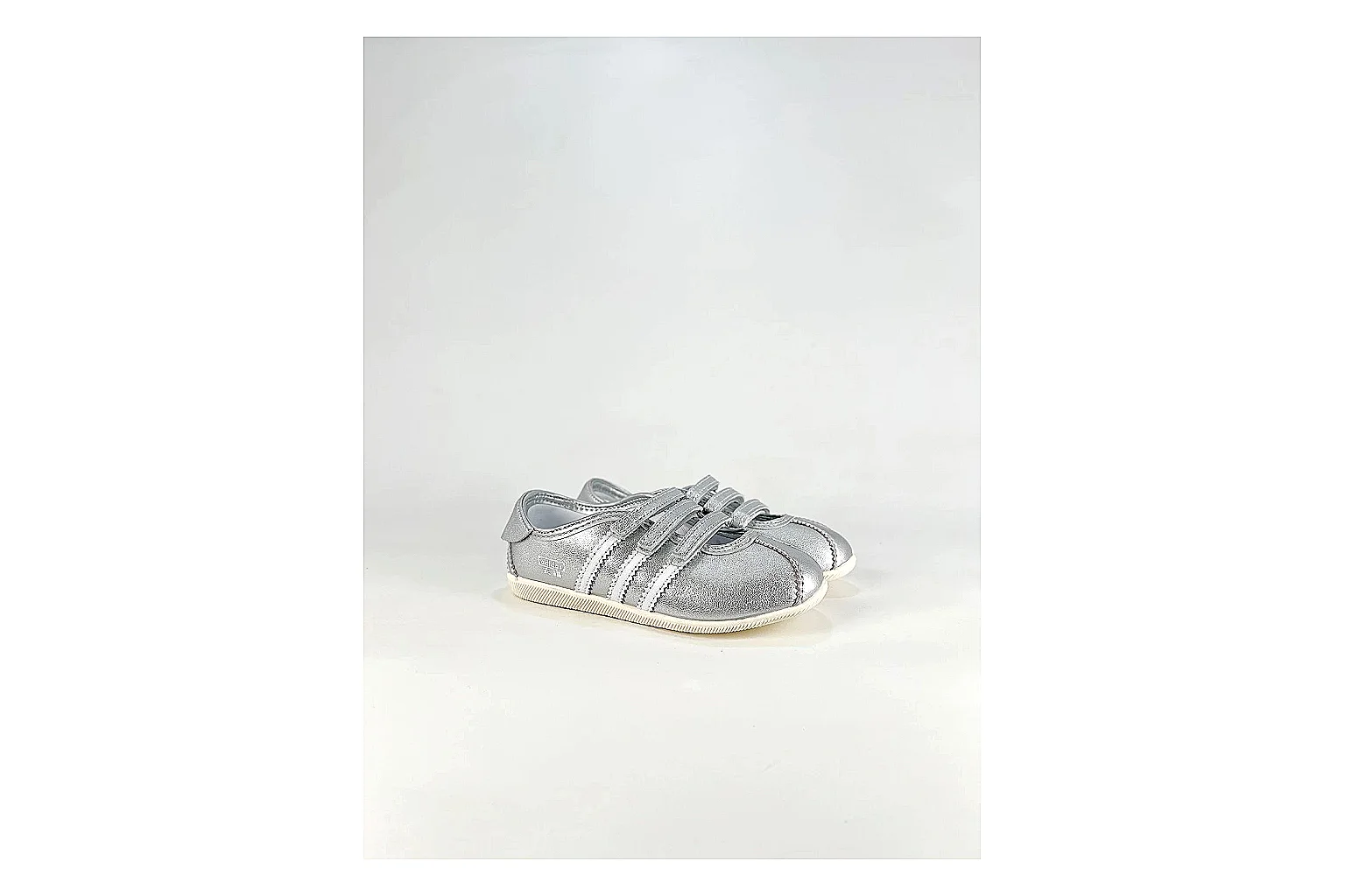 Adidas Originals Anfisa Silver Sneakers shopping brief image showing silver low-top sneakers with leather texture, side-profile shape, upper panel lines, and outsole detail thumbnail 4