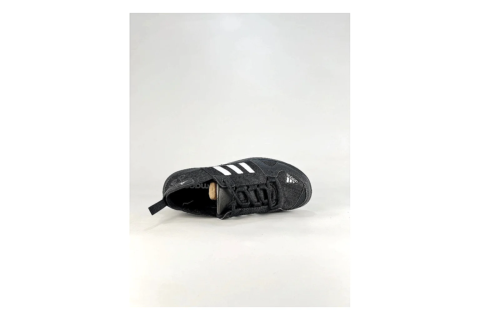 Adidas Originals Daroga Black White Sneakers shopping brief image showing black white low-top sneakers with mesh texture, side-profile shape, upper panel lines, and outsole detail thumbnail 5