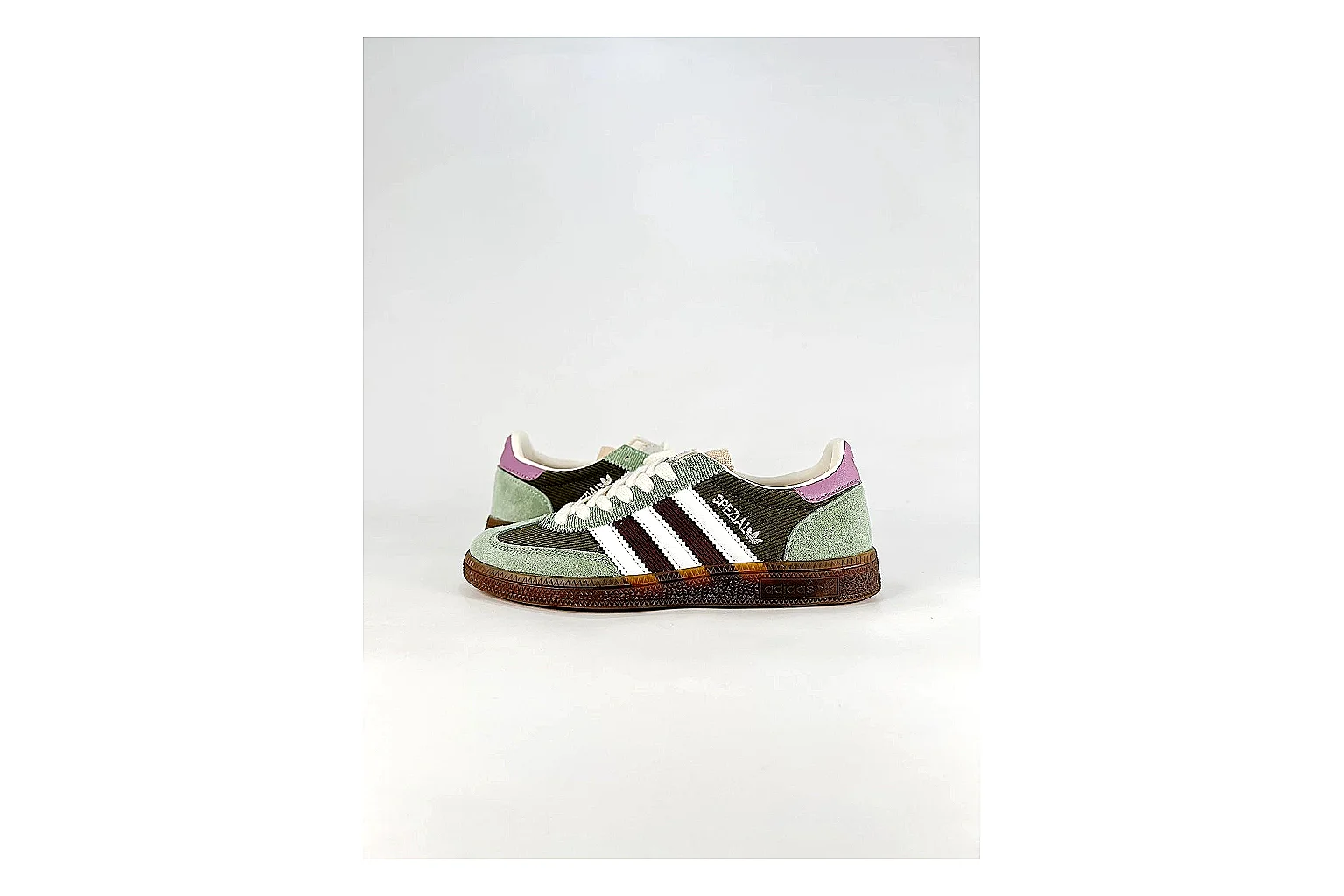 Adidas Originals Handball Spezial Green Brown Sneakers shopping brief image showing green brown handball sneakers with suede-leather texture, side-profile shape, upper panel lines, and outsole detail