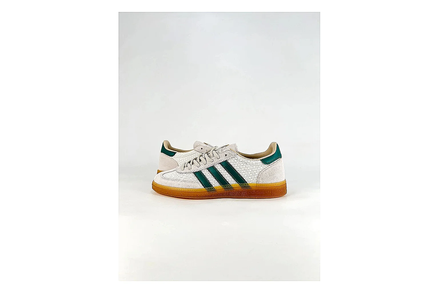 Adidas Originals Handball Spezial White Green Sneakers shopping brief image showing white green handball sneakers with suede-leather texture, side-profile shape, upper panel lines, and outsole detail