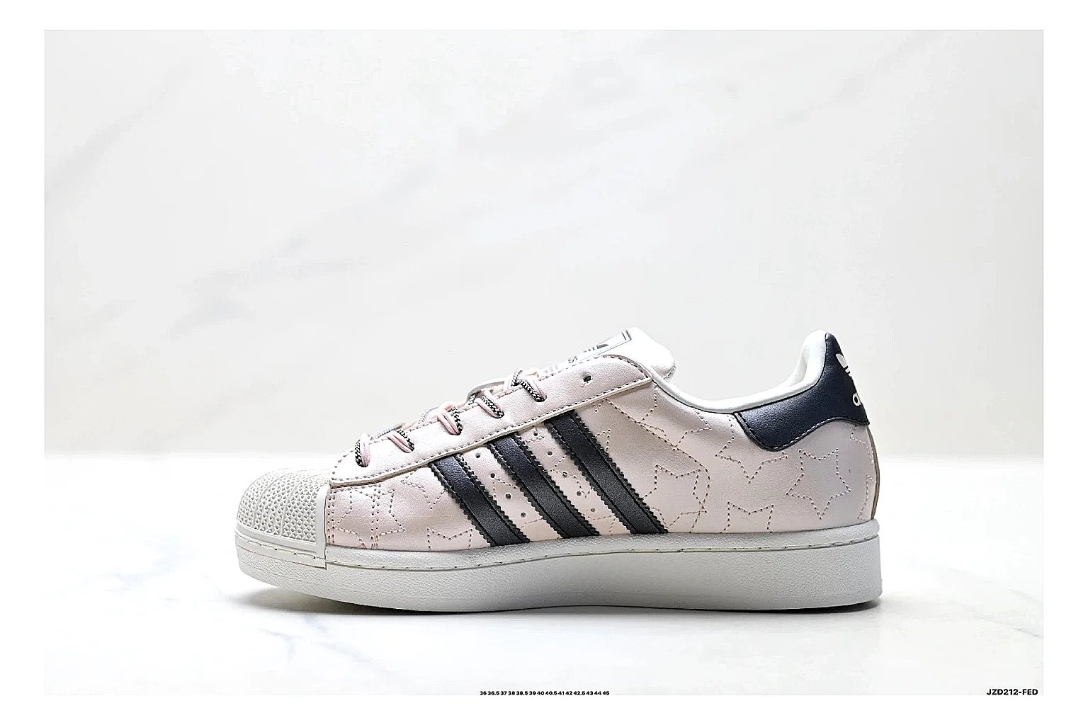 Adidas Originals Samba White Pink Sneakers shopping brief image showing white pink terrace sneakers with leather texture, side-profile shape, upper panel lines, and outsole detail thumbnail 4