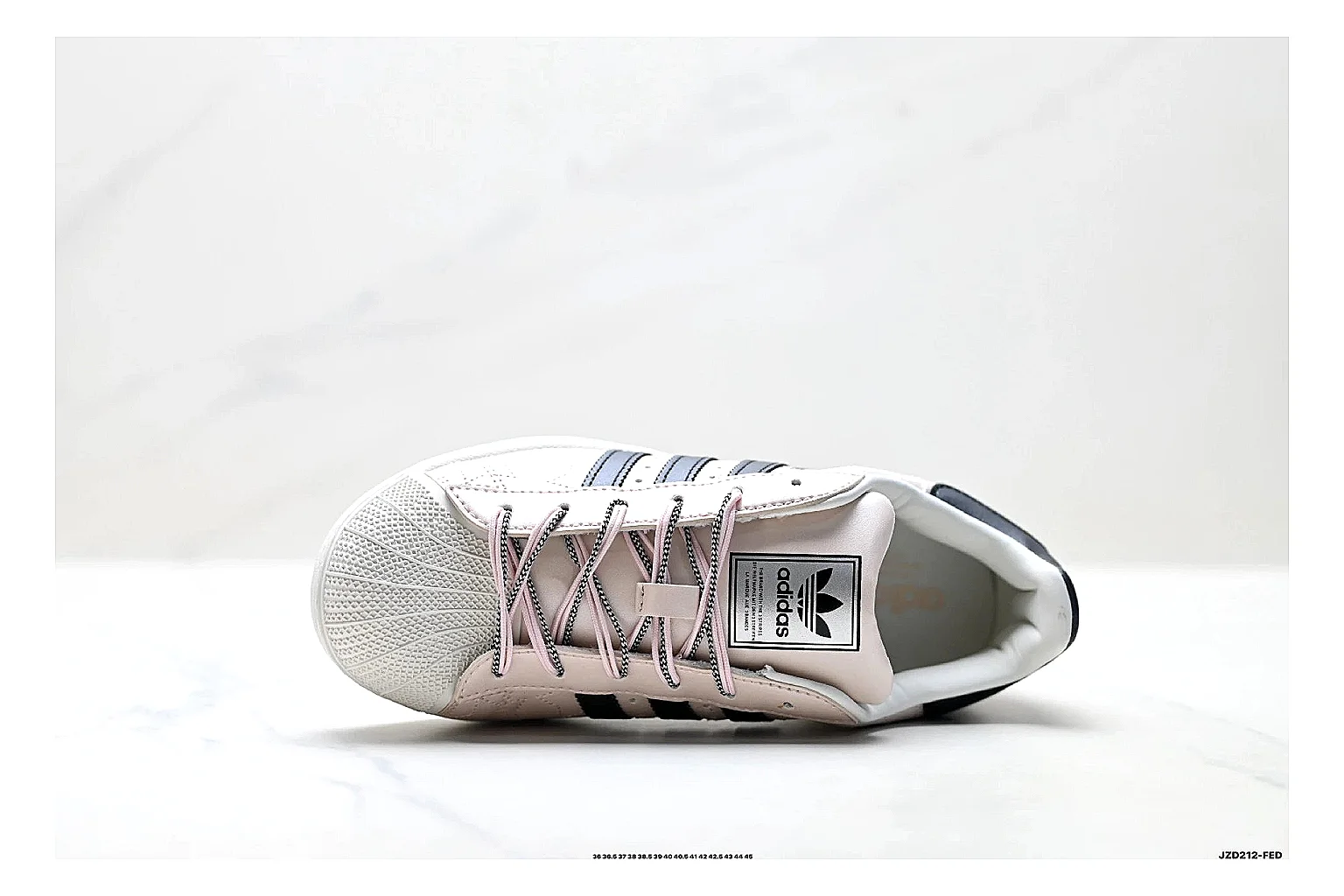 Adidas Originals Samba White Pink Sneakers shopping brief image showing white pink terrace sneakers with leather texture, side-profile shape, upper panel lines, and outsole detail thumbnail 5