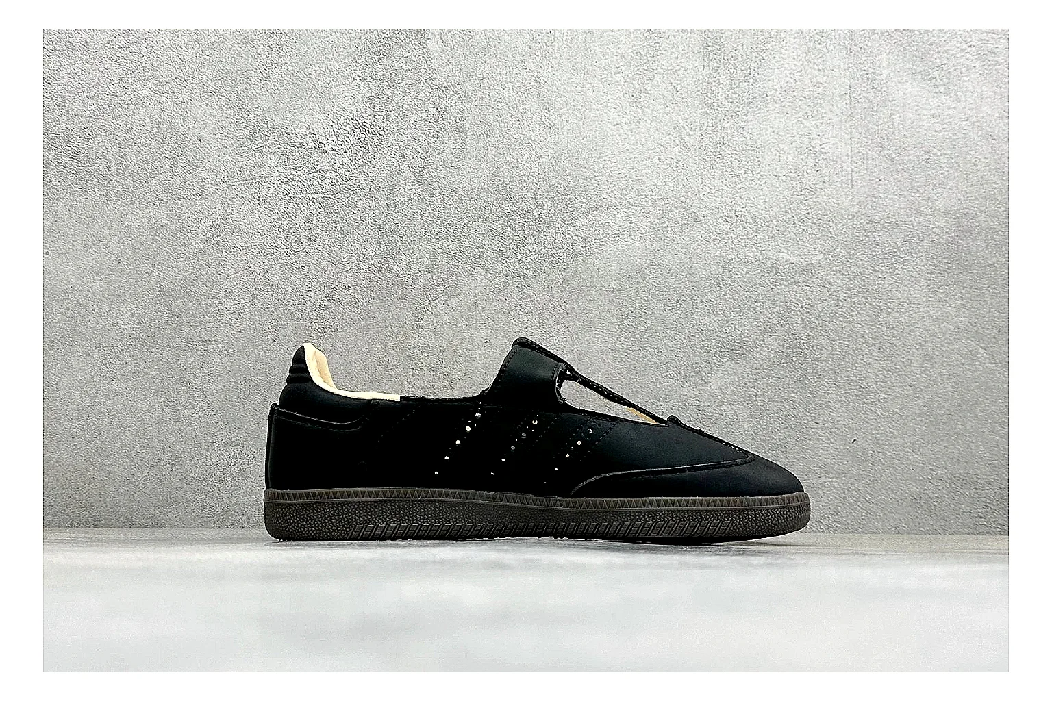 Adidas Samba Jane Black shopping brief photo showing black Mary Jane upper, Samba-style stripes, strap closure, gum outsole, and low terrace shape thumbnail 4