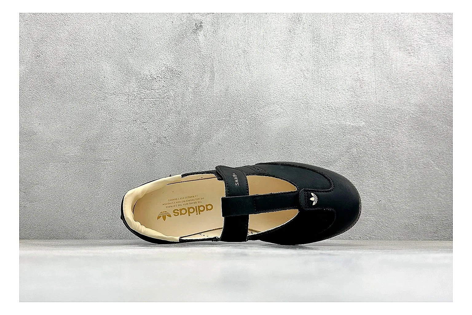 Adidas Samba Jane Black shopping brief photo showing black Mary Jane upper, Samba-style stripes, strap closure, gum outsole, and low terrace shape thumbnail 5