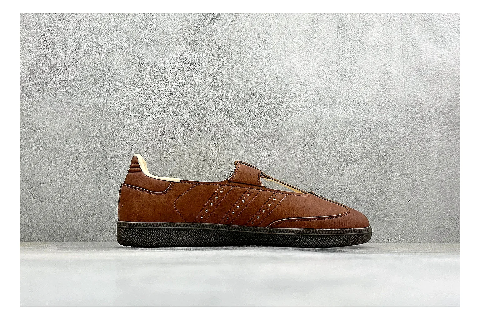 Adidas Samba Jane Brown shopping brief photo showing brown Mary Jane upper, Samba-style side stripes, strap closure, gum outsole, and low terrace profile thumbnail 4
