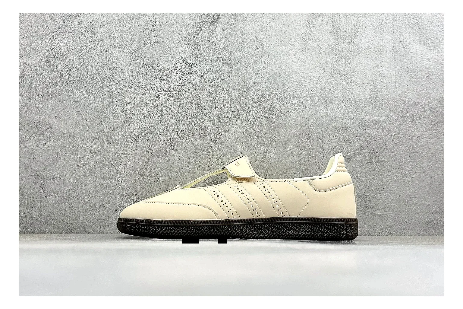 Adidas Samba Jane Cream shopping brief photo showing cream Mary Jane upper, dark gum outsole, Samba-style side stripes, and low strap silhouette
