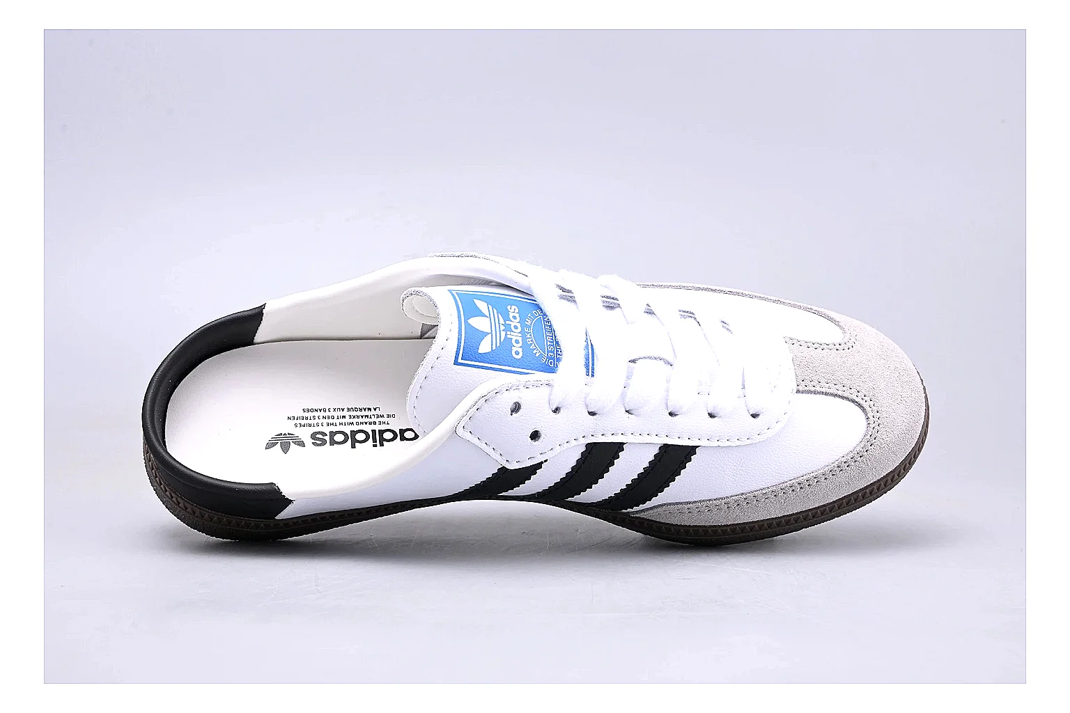Adidas Samba OG White Black shopping brief image showing white black samba og terrace sneaker with mixed upper and terrace shape thumbnail 5