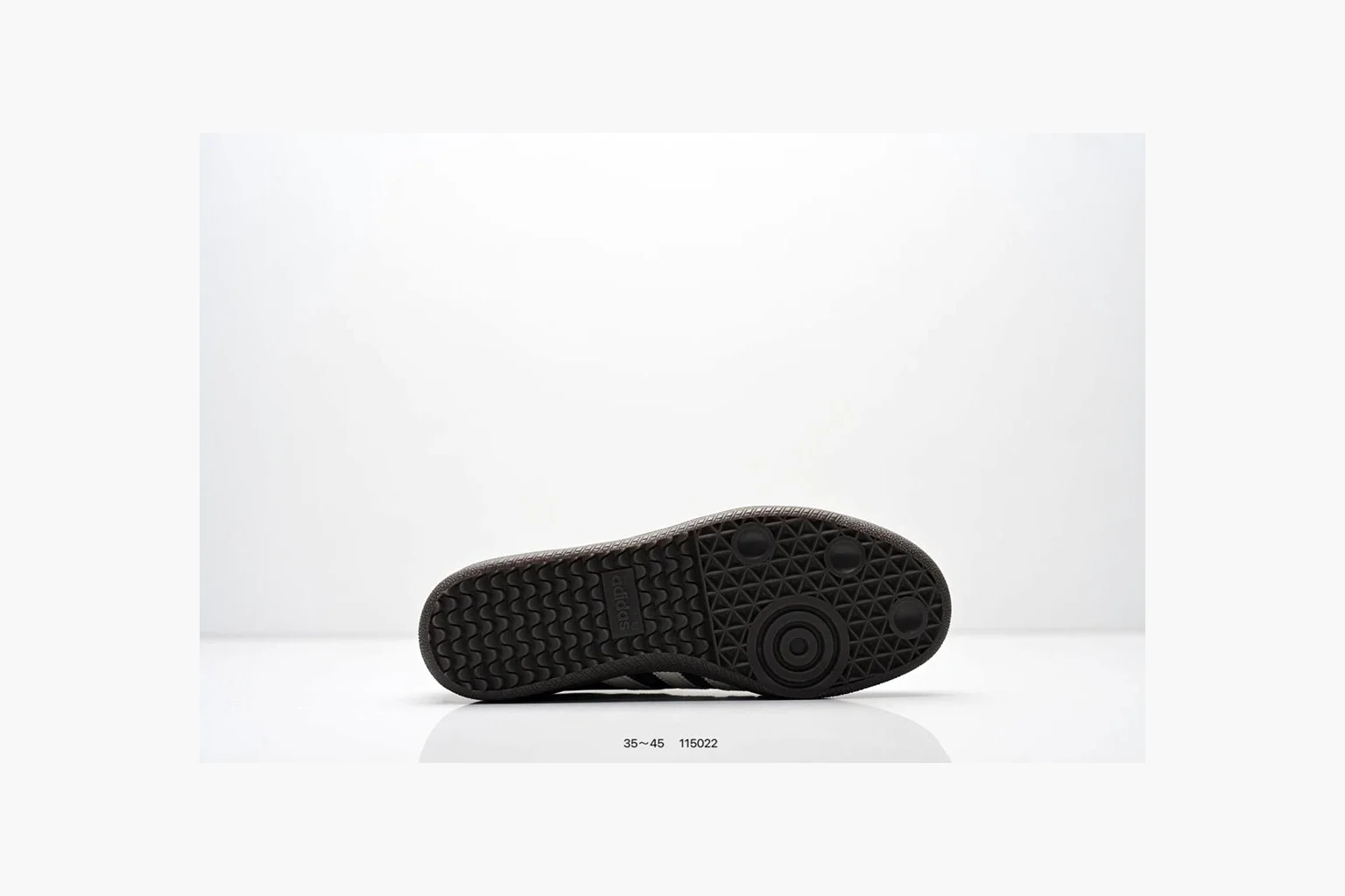 Adidas Samba OG Black White Gold shopping brief photo showing black leather-suede low-top upper, white three stripes, gold tongue label, gum sole, and classic Samba side profile thumbnail 2