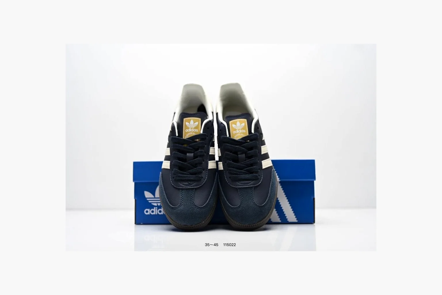 Adidas Samba OG Black White Gold shopping brief photo showing black leather-suede low-top upper, white three stripes, gold tongue label, gum sole, and classic Samba side profile thumbnail 3