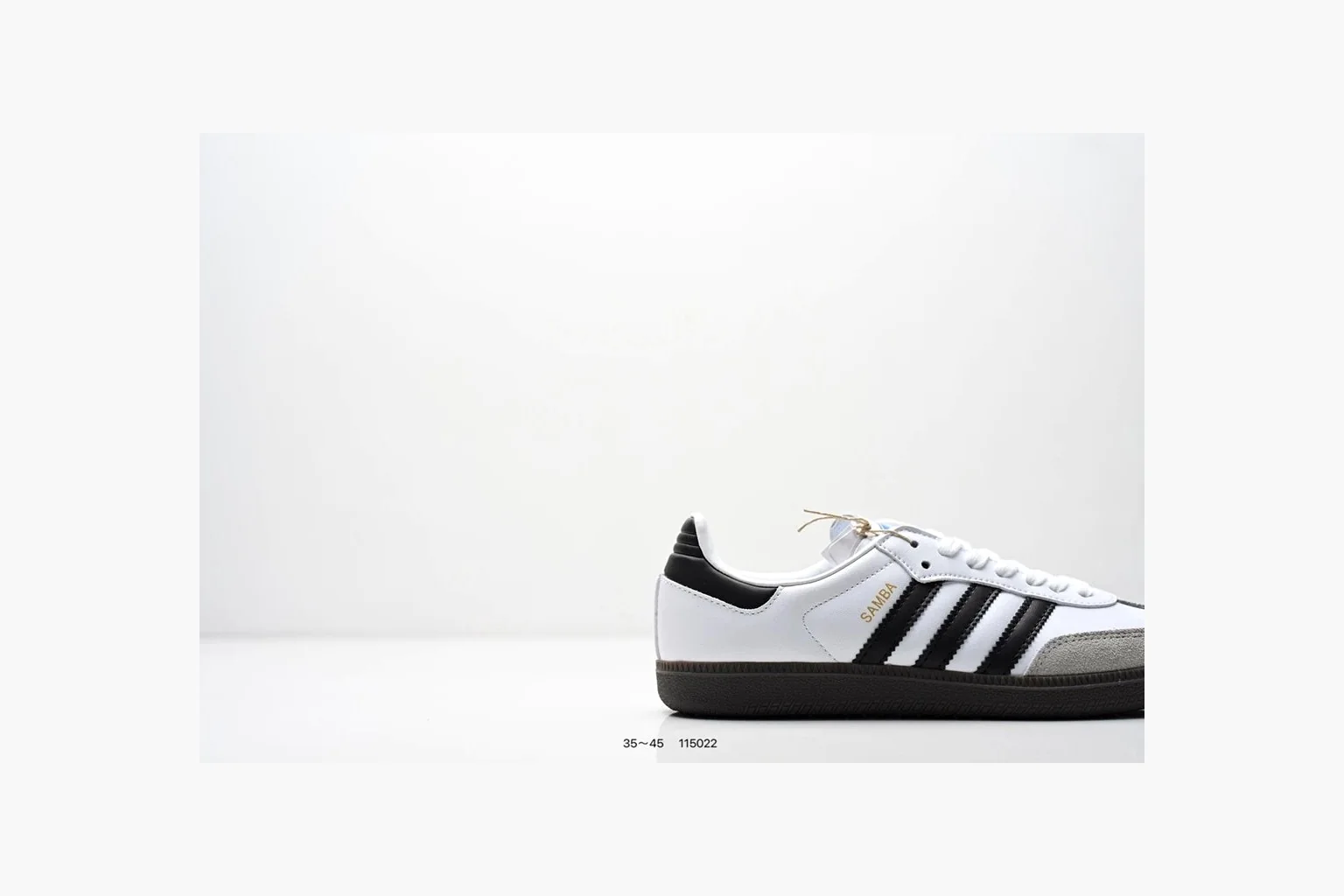 Adidas Samba OG White Black Blue shopping brief photo showing white leather-suede low-top upper, black three stripes, blue heel detail, gum terrace sole, and slim Samba profile thumbnail 4