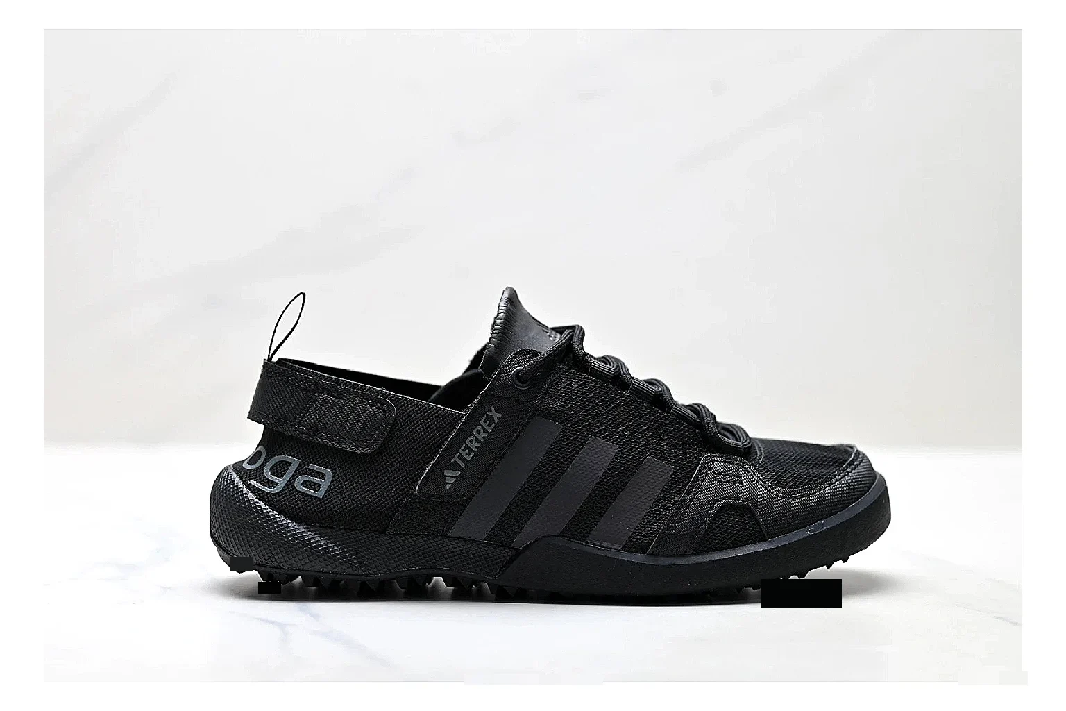 Adidas Terrex Daroga Black Sneakers shopping brief image showing black outdoor trail sneakers with mesh texture, side-profile shape, upper panel lines, and outsole detail