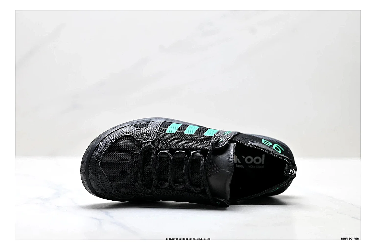 Adidas Terrex Daroga Black Green Sneakers shopping brief image showing black green outdoor trail sneakers with mesh texture, side-profile shape, upper panel lines, and outsole detail thumbnail 5