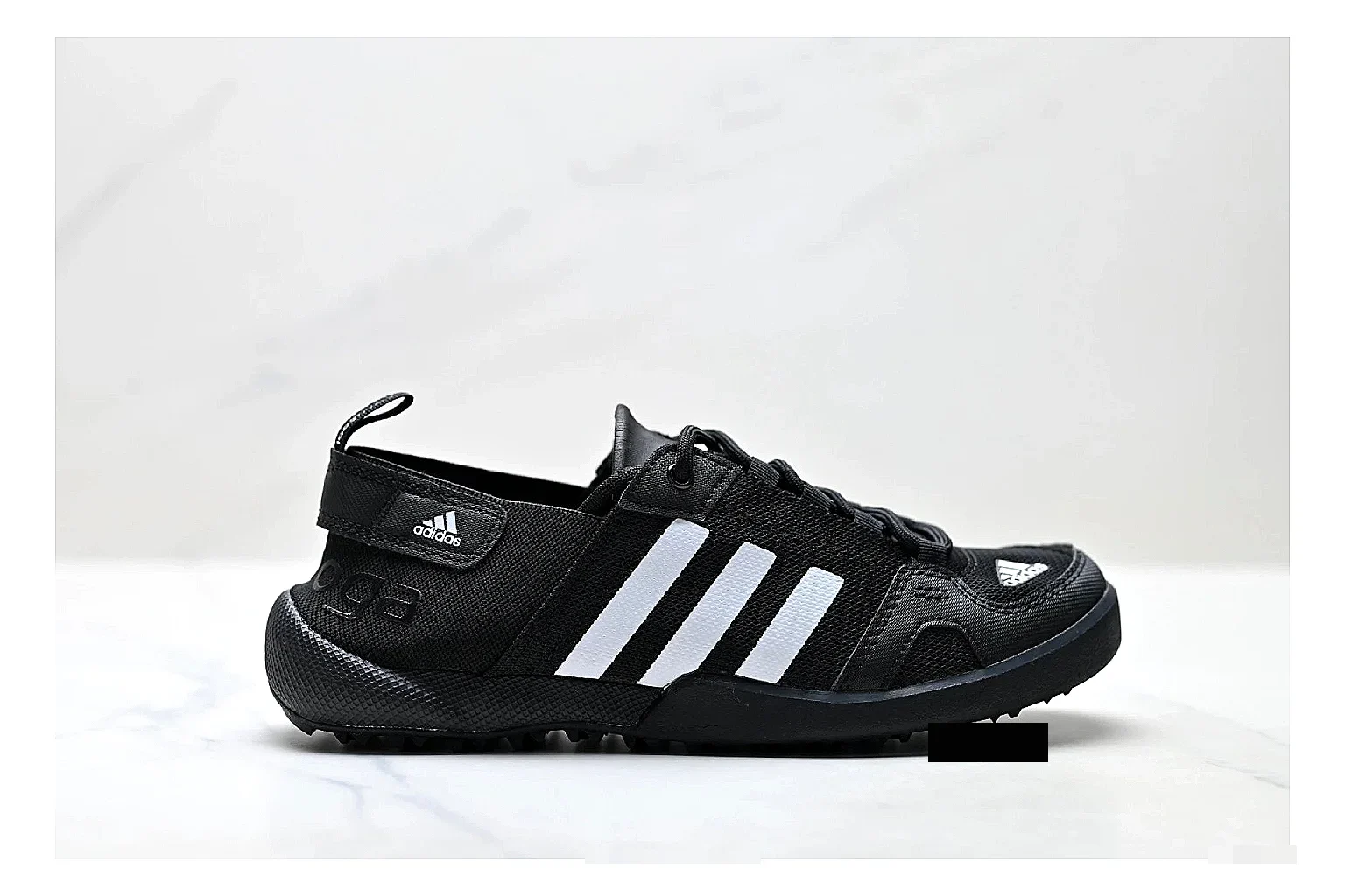 Adidas Terrex Daroga Black White Sneakers shopping brief image showing black white outdoor trail sneakers with mesh texture, side-profile shape, upper panel lines, and outsole detail