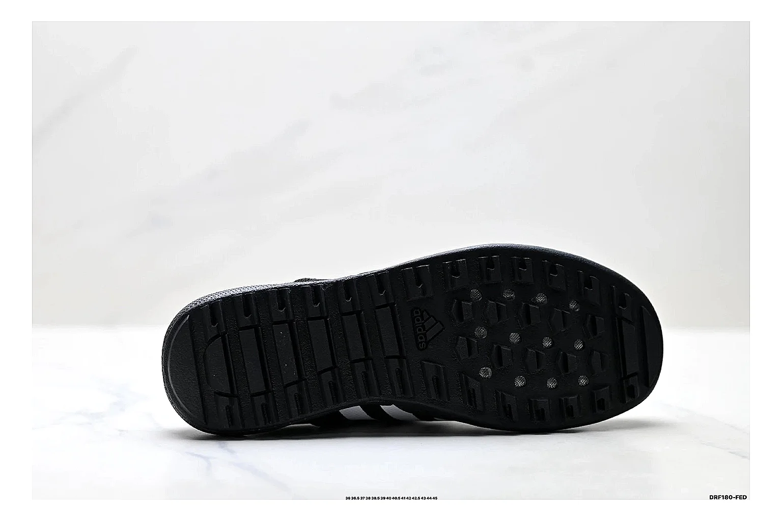 Adidas Terrex Daroga Black White Sneakers shopping brief image showing black white outdoor trail sneakers with mesh texture, side-profile shape, upper panel lines, and outsole detail thumbnail 2