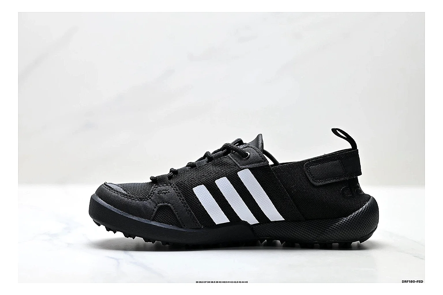 Adidas Terrex Daroga Black White Sneakers shopping brief image showing black white outdoor trail sneakers with mesh texture, side-profile shape, upper panel lines, and outsole detail thumbnail 4