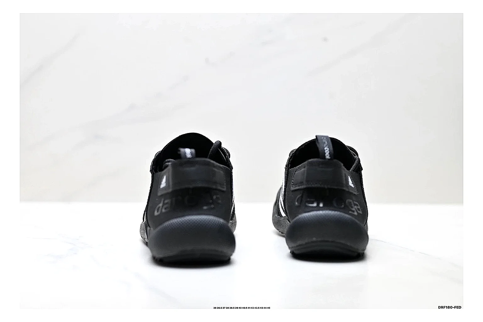 Adidas Terrex Daroga Black White Sneakers shopping brief image showing black white outdoor trail sneakers with mesh texture, side-profile shape, upper panel lines, and outsole detail thumbnail 6