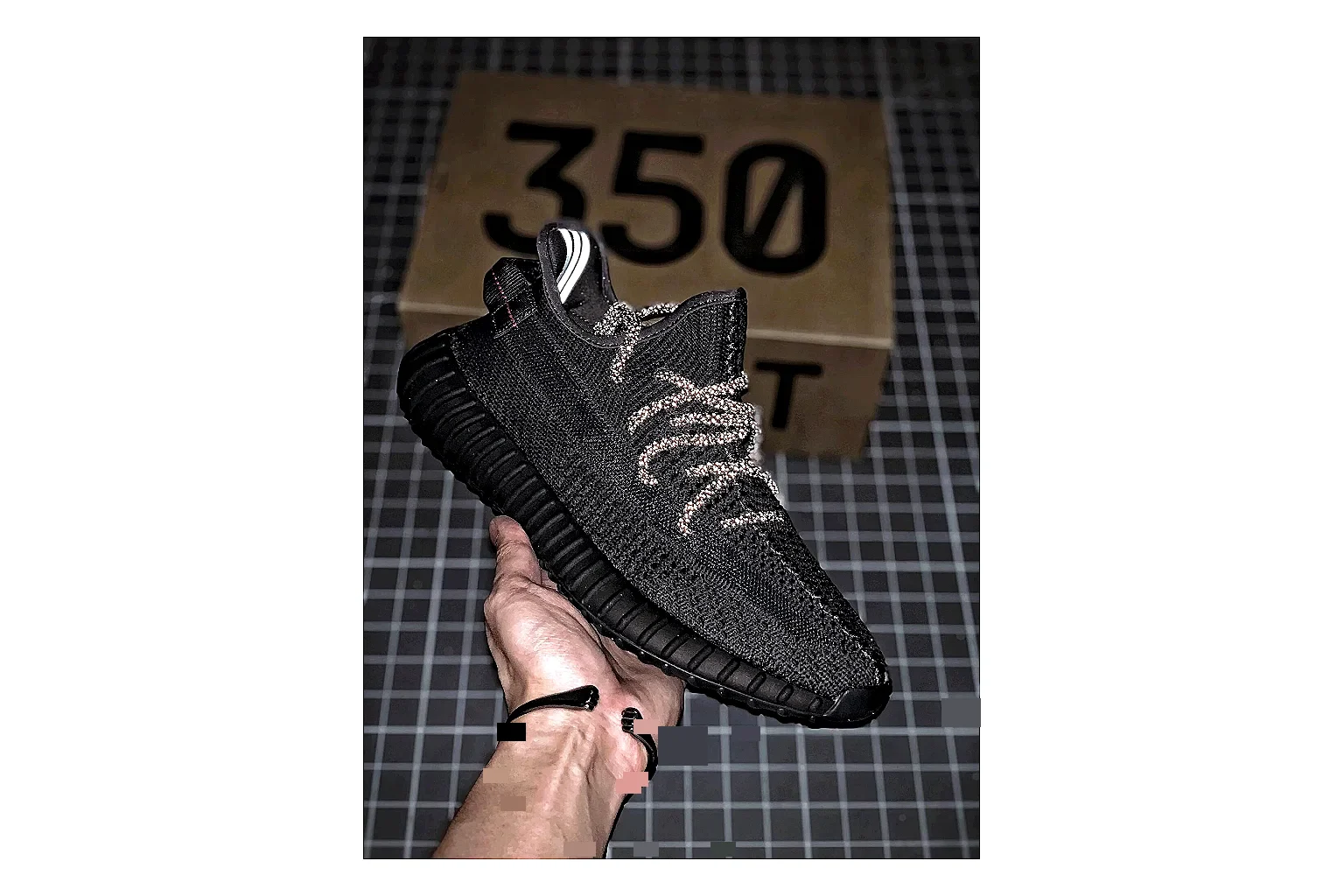 Adidas Yeezy 350 Boost Black shopping brief image showing black yeezy 350 knit runner with knit upper and knit shape