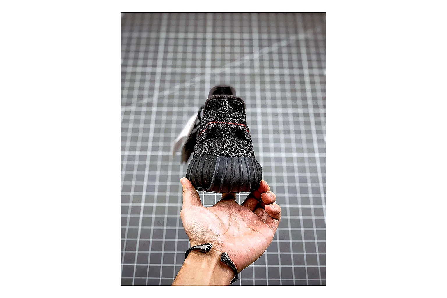 Adidas Yeezy 350 Boost Black shopping brief image showing black yeezy 350 knit runner with knit upper and knit shape thumbnail 2