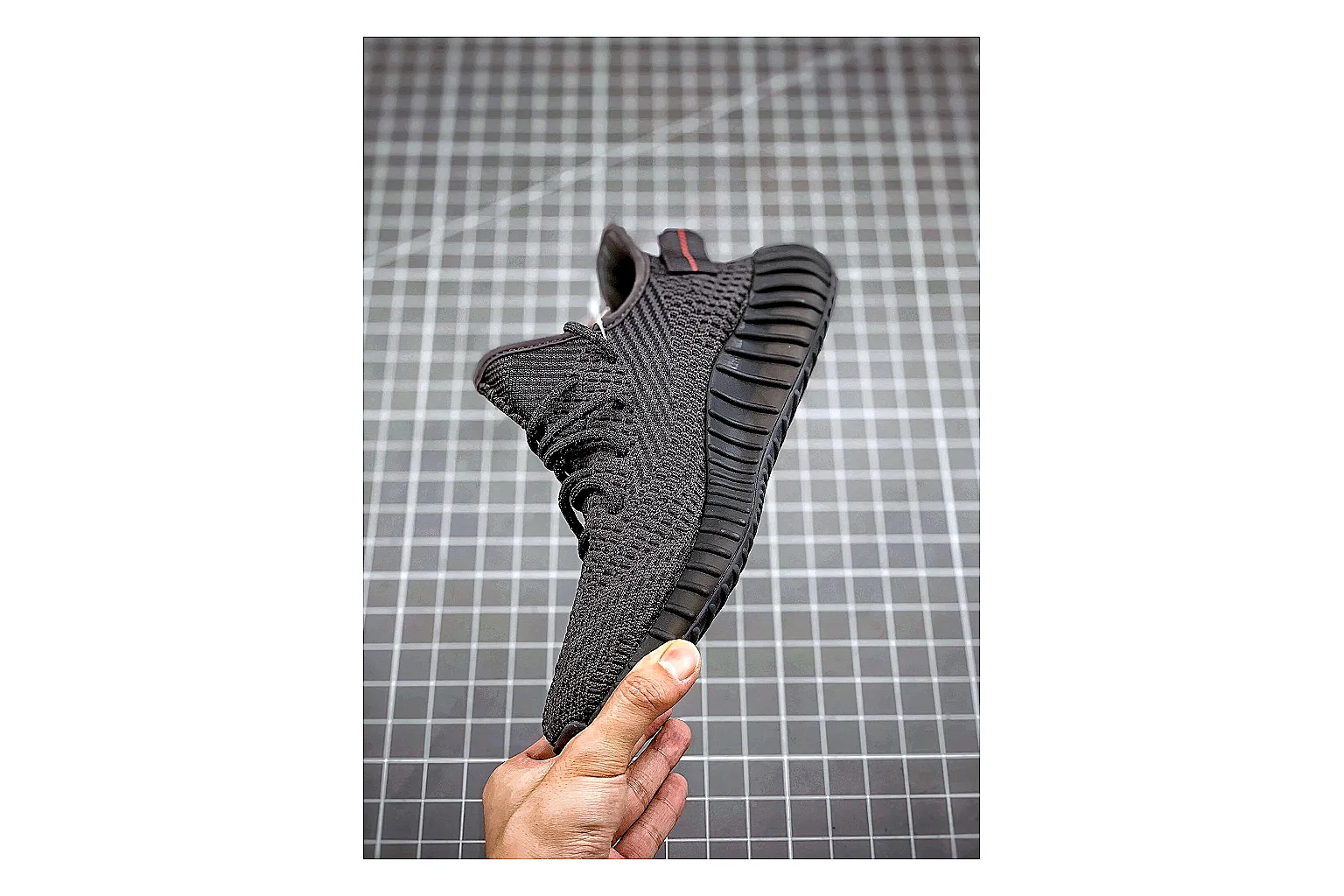 Adidas Yeezy 350 Boost Black shopping brief image showing black yeezy 350 knit runner with knit upper and knit shape thumbnail 3