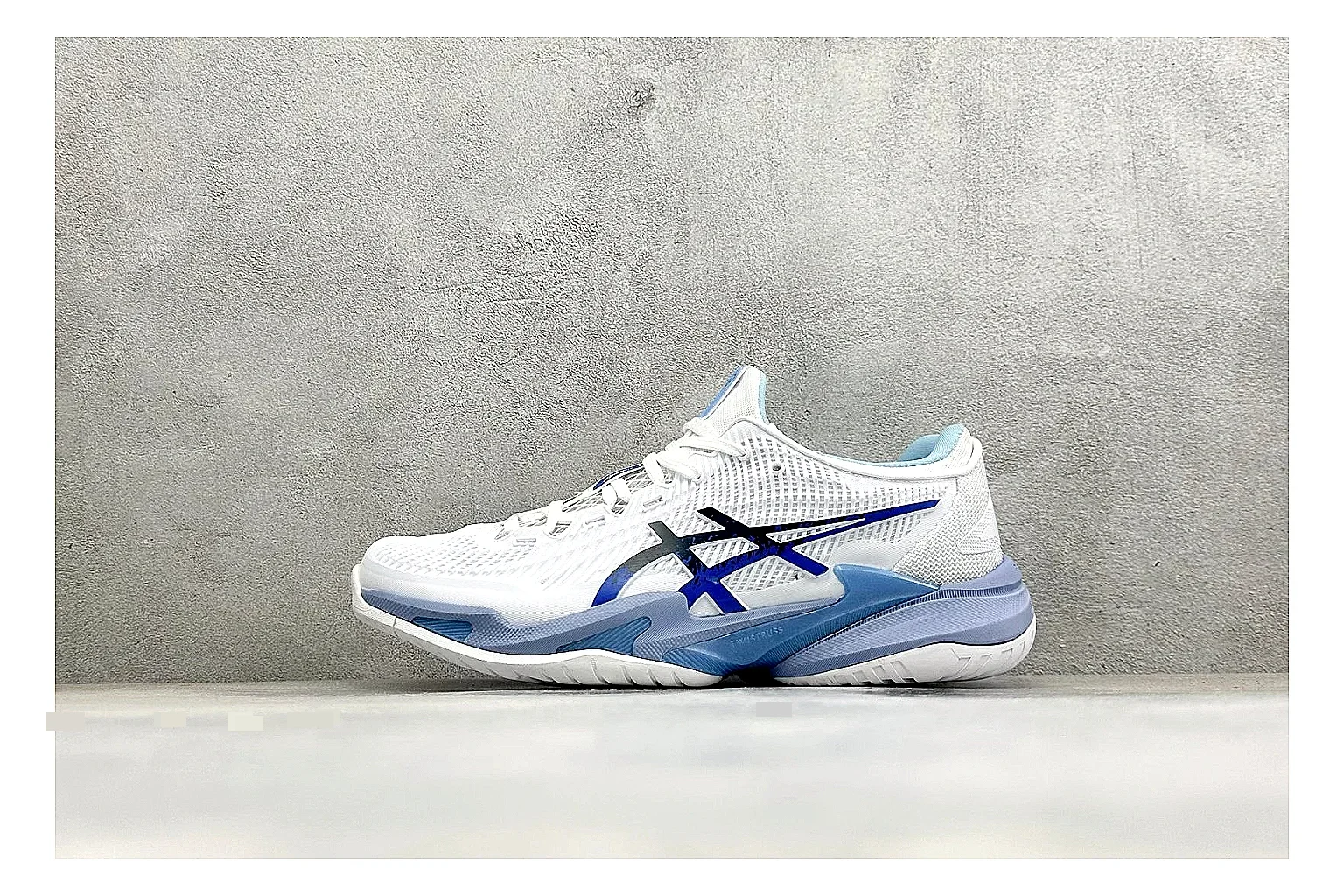 Asics Court FF White Blue shopping brief photo showing white tennis upper, blue Asics side lines, supportive sole wall, and stable court profile