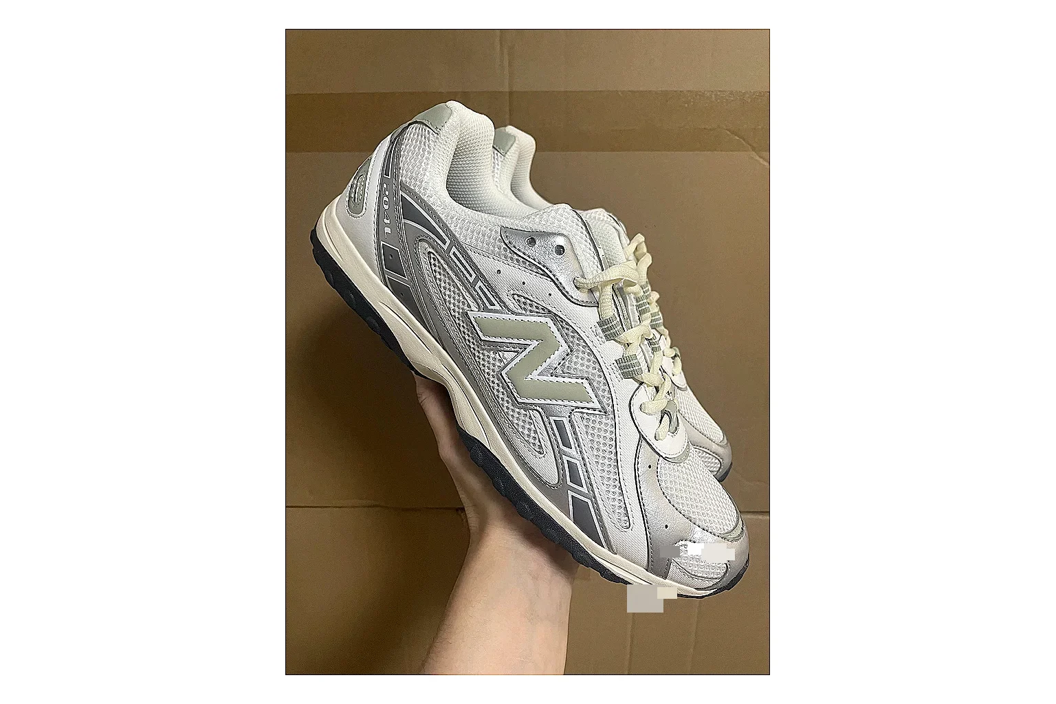 Asics Gel Kayano White Silver shopping brief photo showing white mesh-leather runner upper, silver overlays, supportive Kayano shape, and cushioned retro sole
