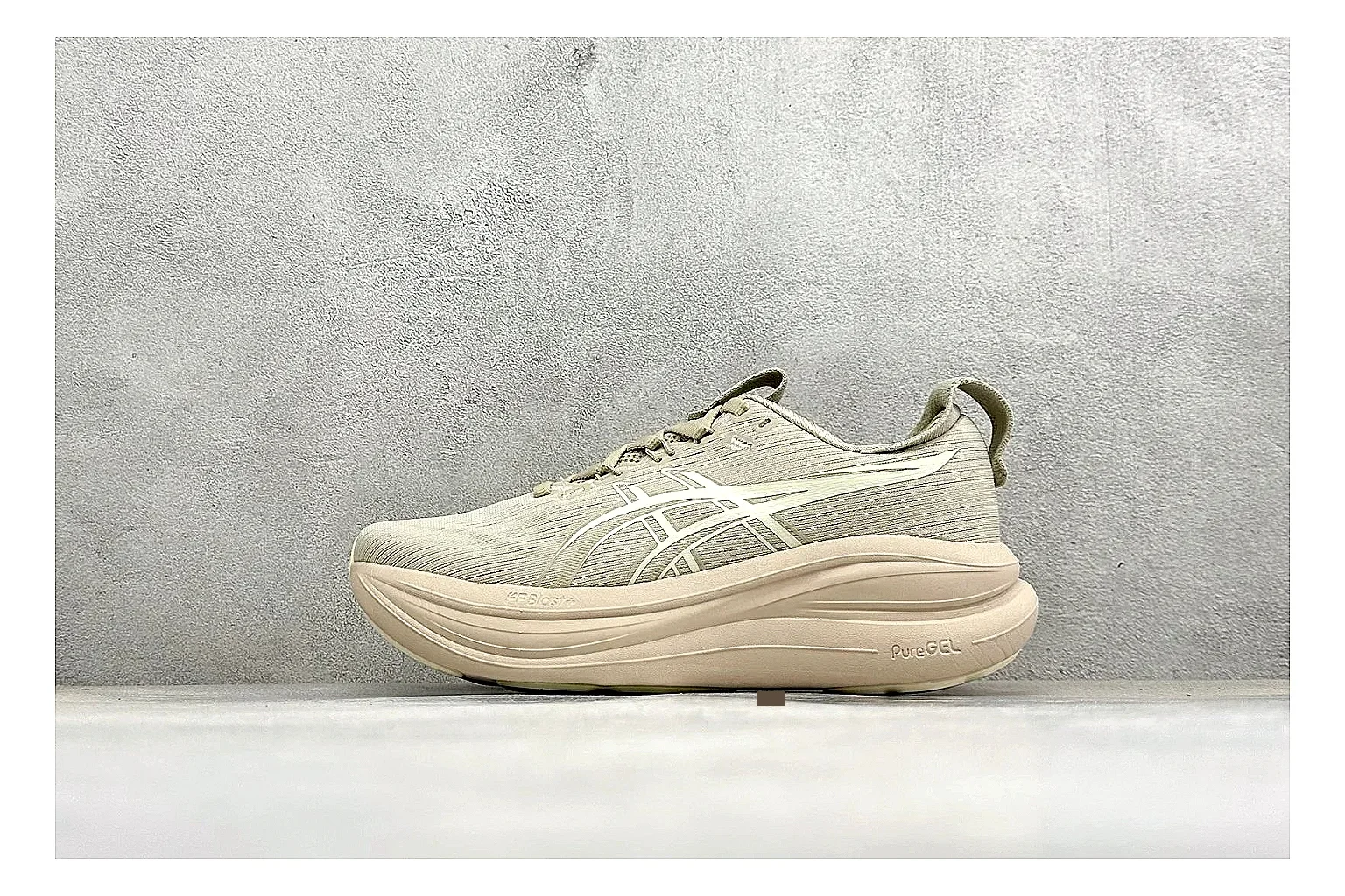 Asics Gel-Nimbus cream runner shopping brief image