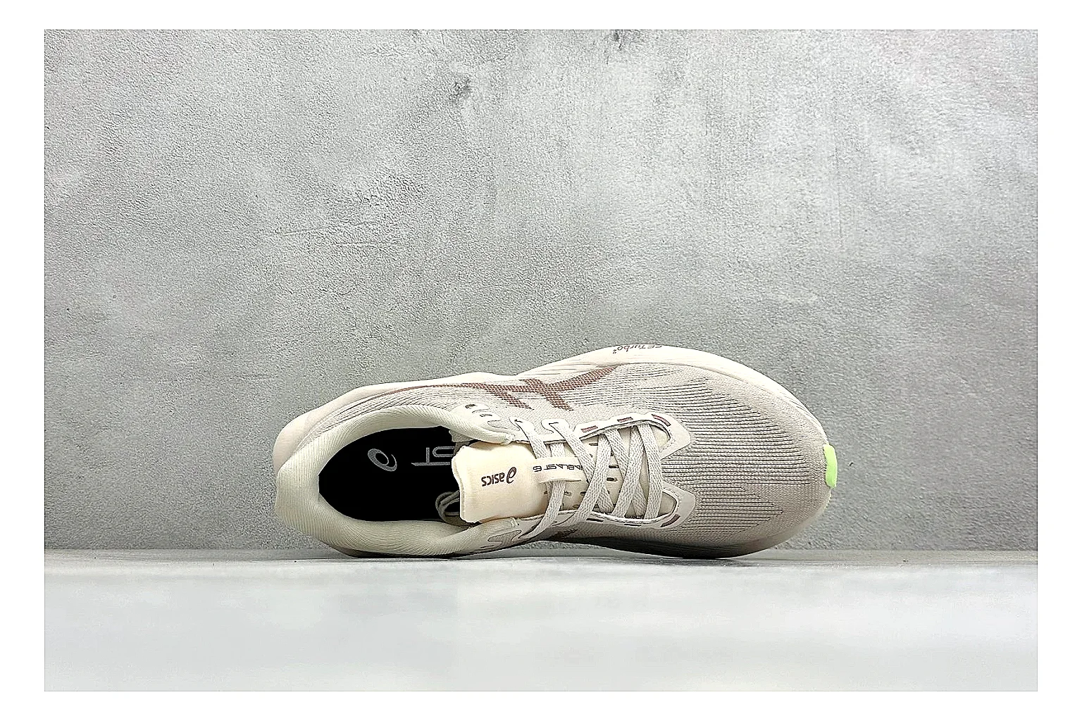 Asics Novablast 6 Cream Green shopping brief photo showing cream running mesh, green side accents, tall cushioned sole, and modern training silhouette thumbnail 5