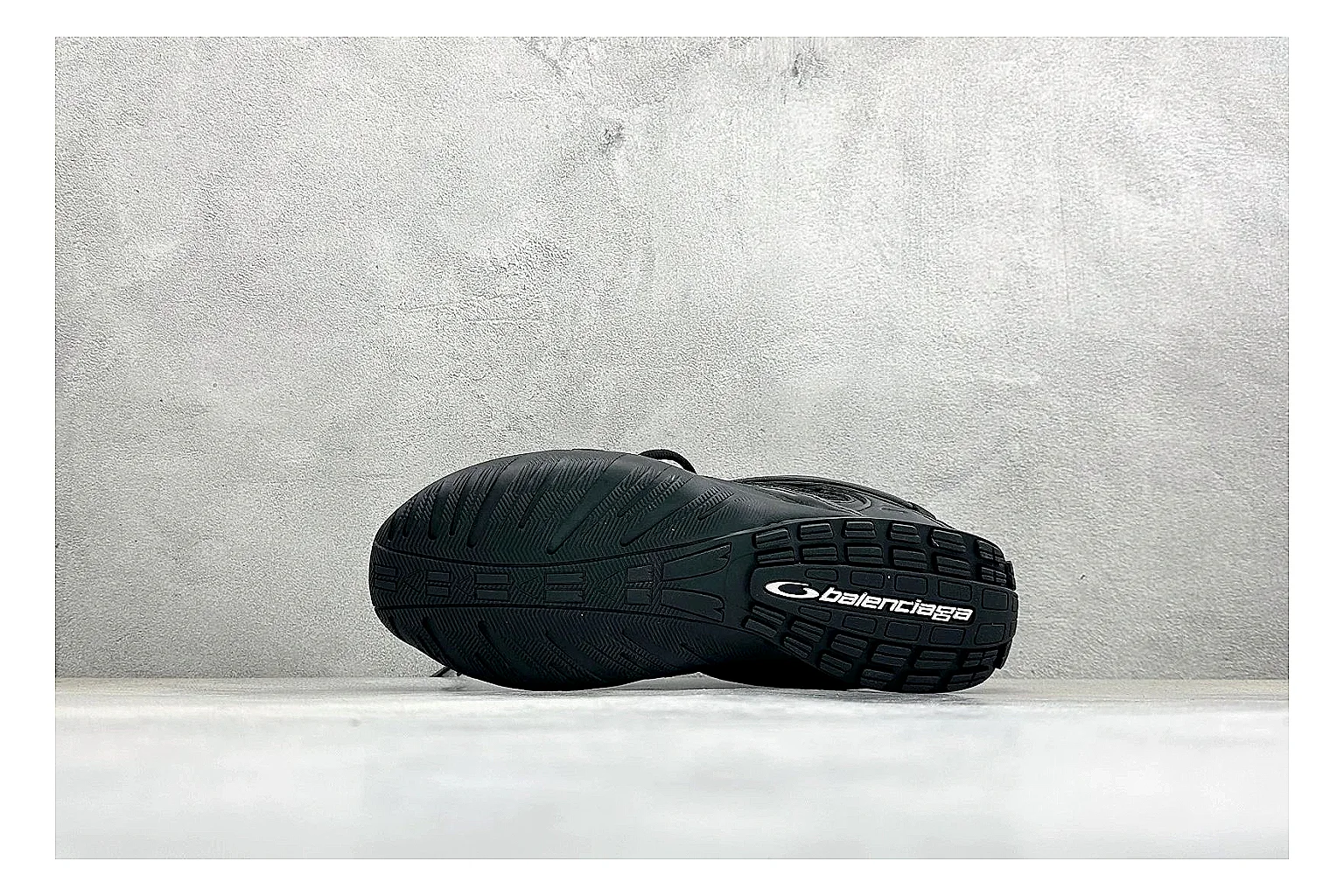 Balenciaga Track Black Low-Top shopping brief photo showing black layered technical upper, complex paneling, chunky runner sole, and tactical low-top shape thumbnail 2