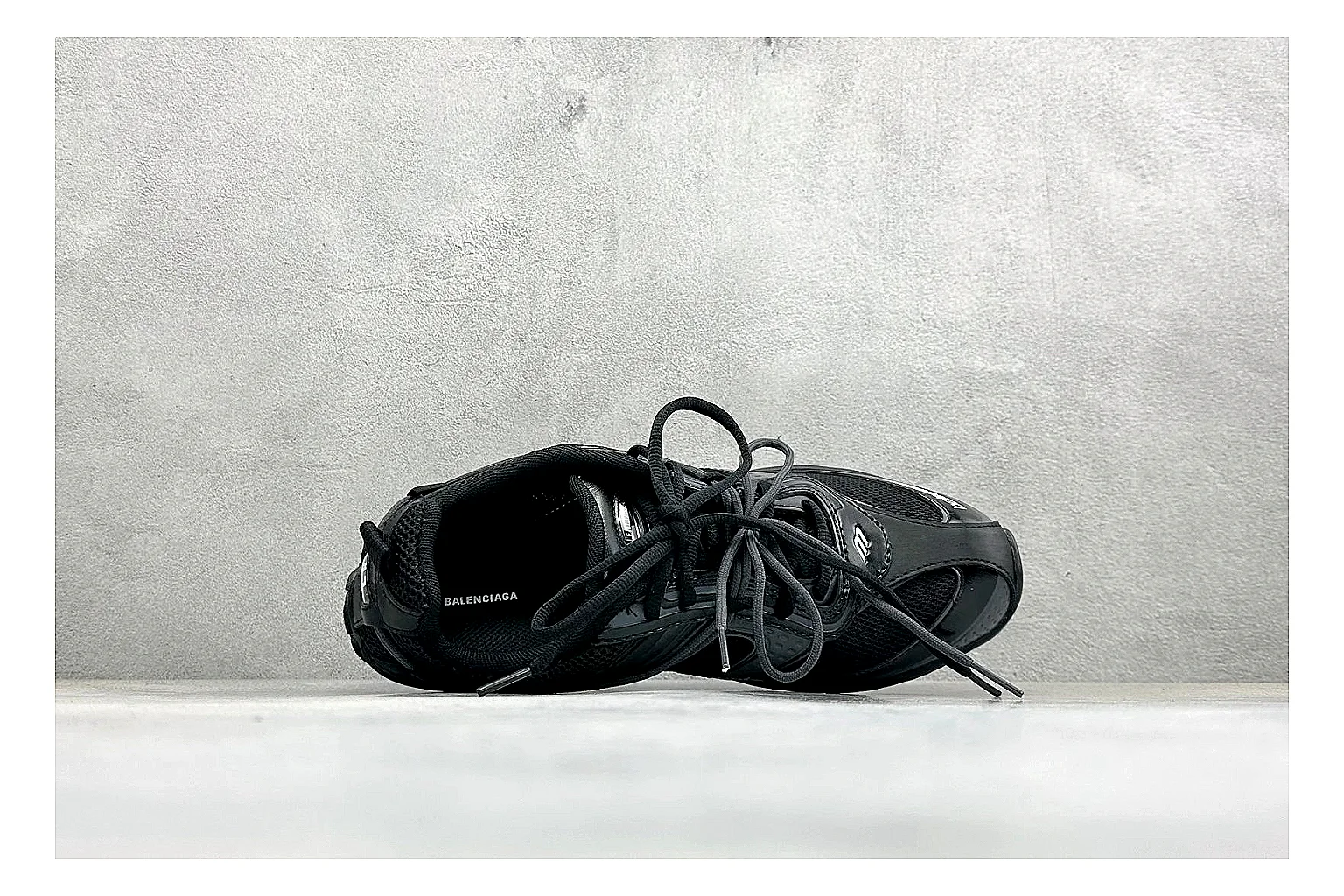 Balenciaga Track Black Low-Top shopping brief photo showing black layered technical upper, complex paneling, chunky runner sole, and tactical low-top shape thumbnail 5