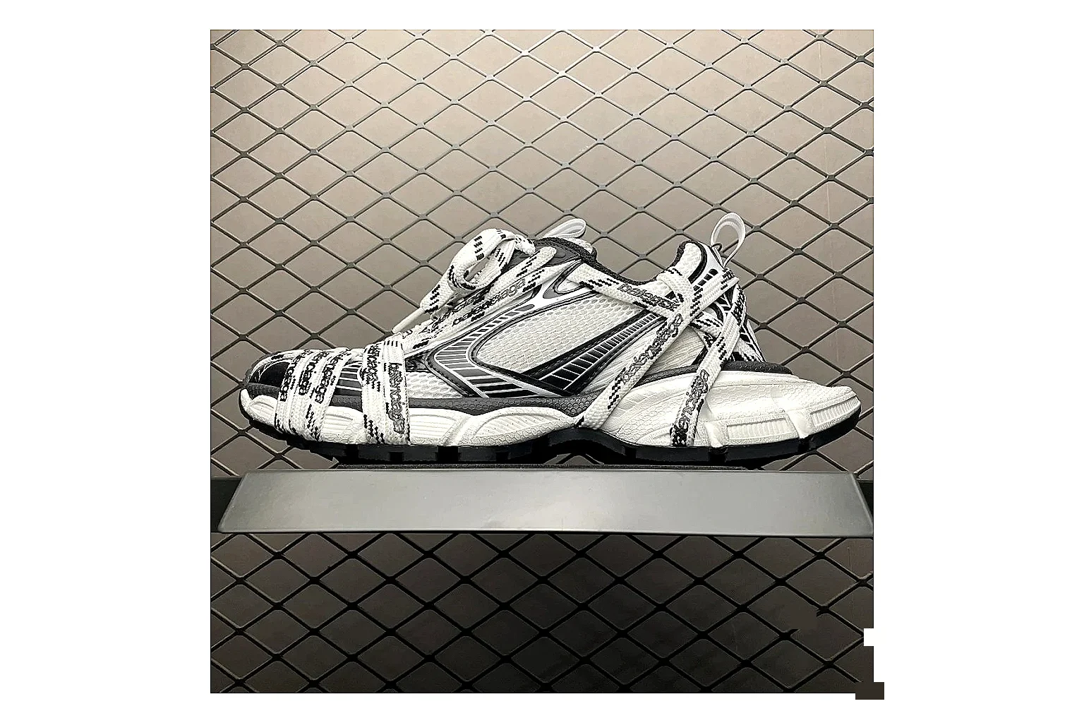 Balenciaga Track White Black Sandal shopping brief image showing white black track sport sandal with mixed upper and sandal shape