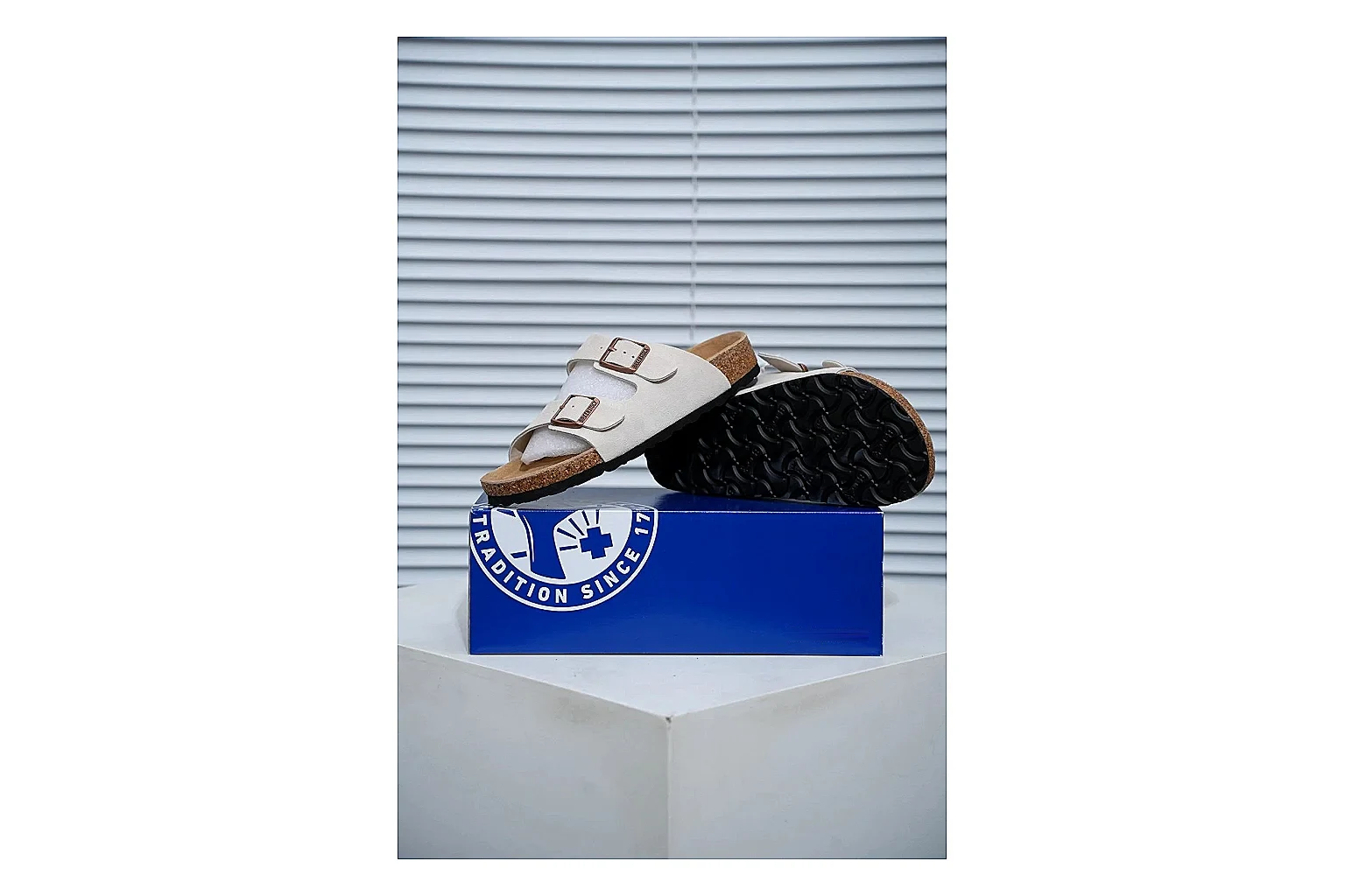 Birkenstock Arizona Cream Cork Slide shopping brief image showing adjustable buckles, soft neutral upper and contoured footbed for easy casual wear thumbnail 4