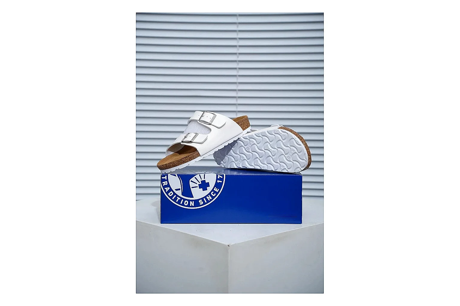 Birkenstock Arizona White Cork Slide shopping brief image showing adjustable buckles, contoured footbed and black outsole for clean summer casual styling thumbnail 4
