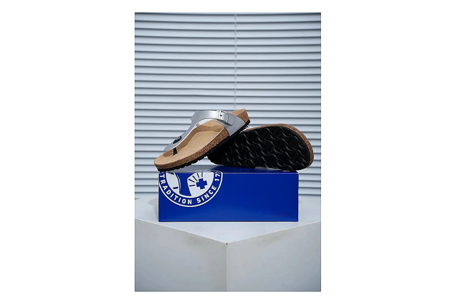 Birkenstock Cream Buckle Cork Slide shopping brief image showing wide strap, large metal buckle and contoured footbed for simple summer comfort thumbnail 4