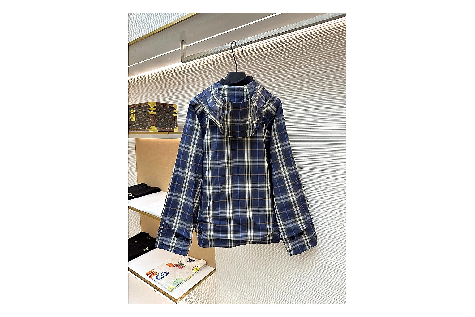 Burberry Reversible Hooded Jacket Navy Check Jacket shopping brief image showing navy reversible hooded check jacket with nylon-cotton texture, hood structure, zipper line, sleeve cuffs, and light shell shape thumbnail 3