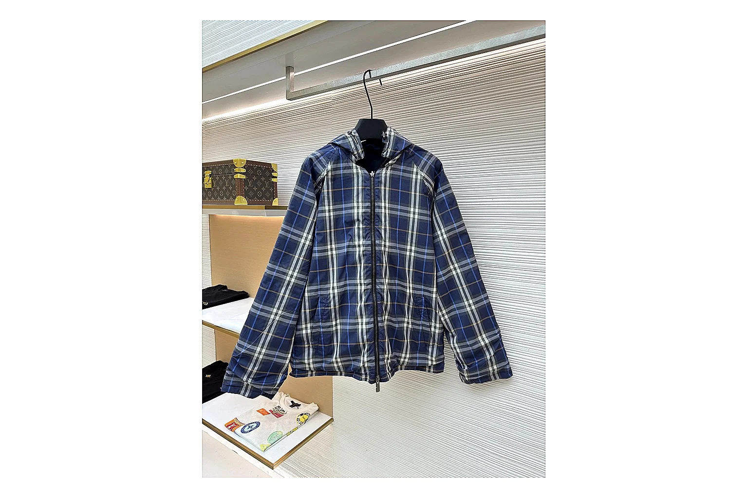 Burberry Reversible Hooded Jacket Navy Check Jacket shopping brief image showing navy reversible hooded check jacket with nylon-cotton texture, hood structure, zipper line, sleeve cuffs, and light shell shape thumbnail 6