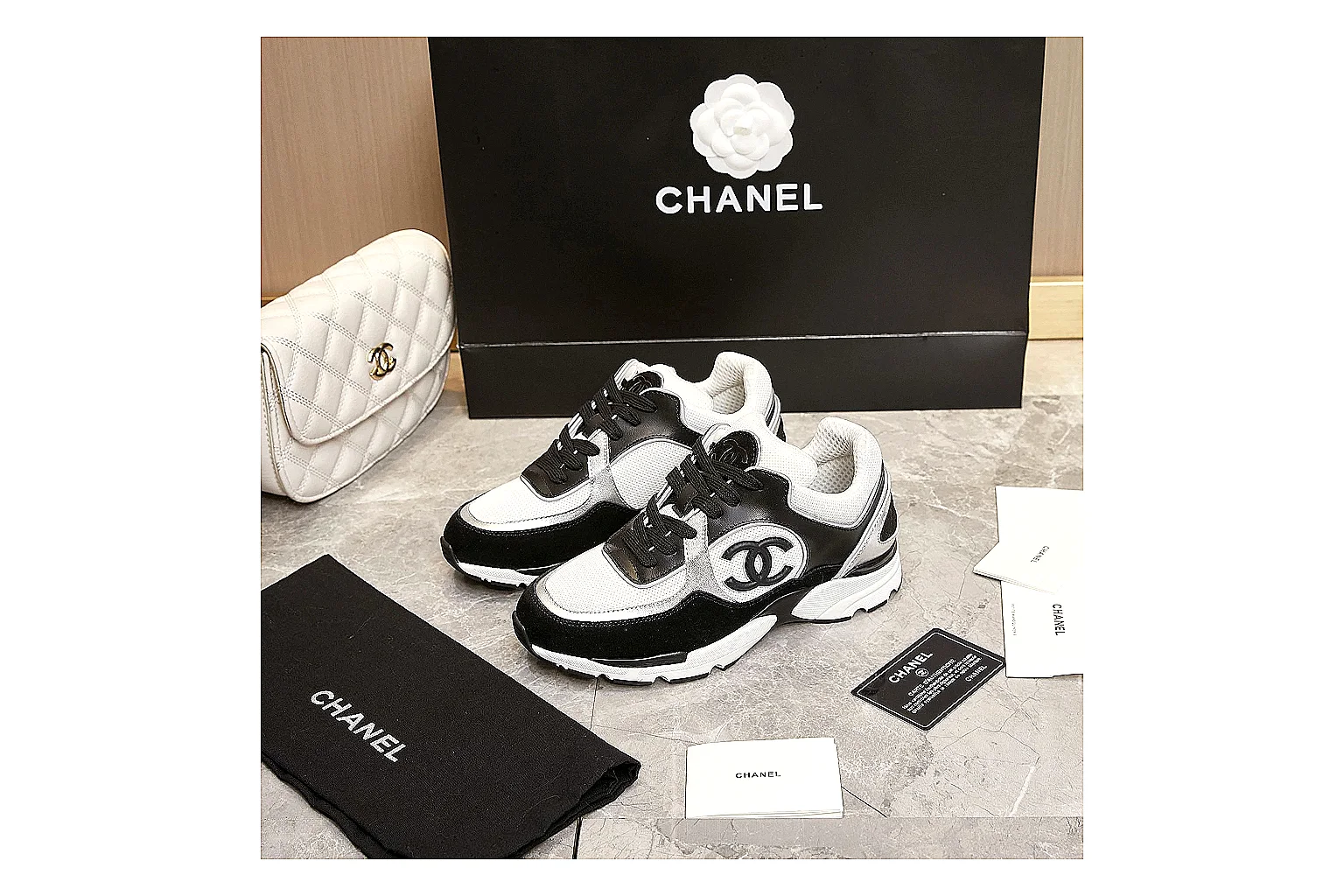 GogoBuy agent brief photos for Chanel Black White Runner Sneaker thumbnail 5