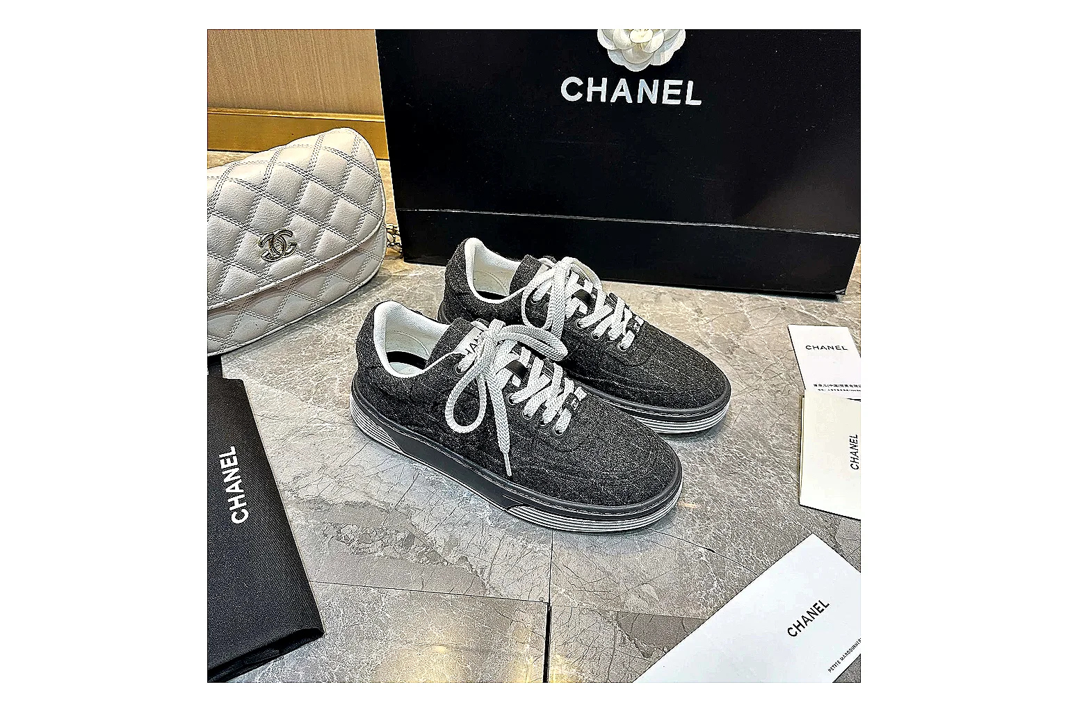 GogoBuy agent brief photos for Chanel Black White Runner Sneaker thumbnail 4