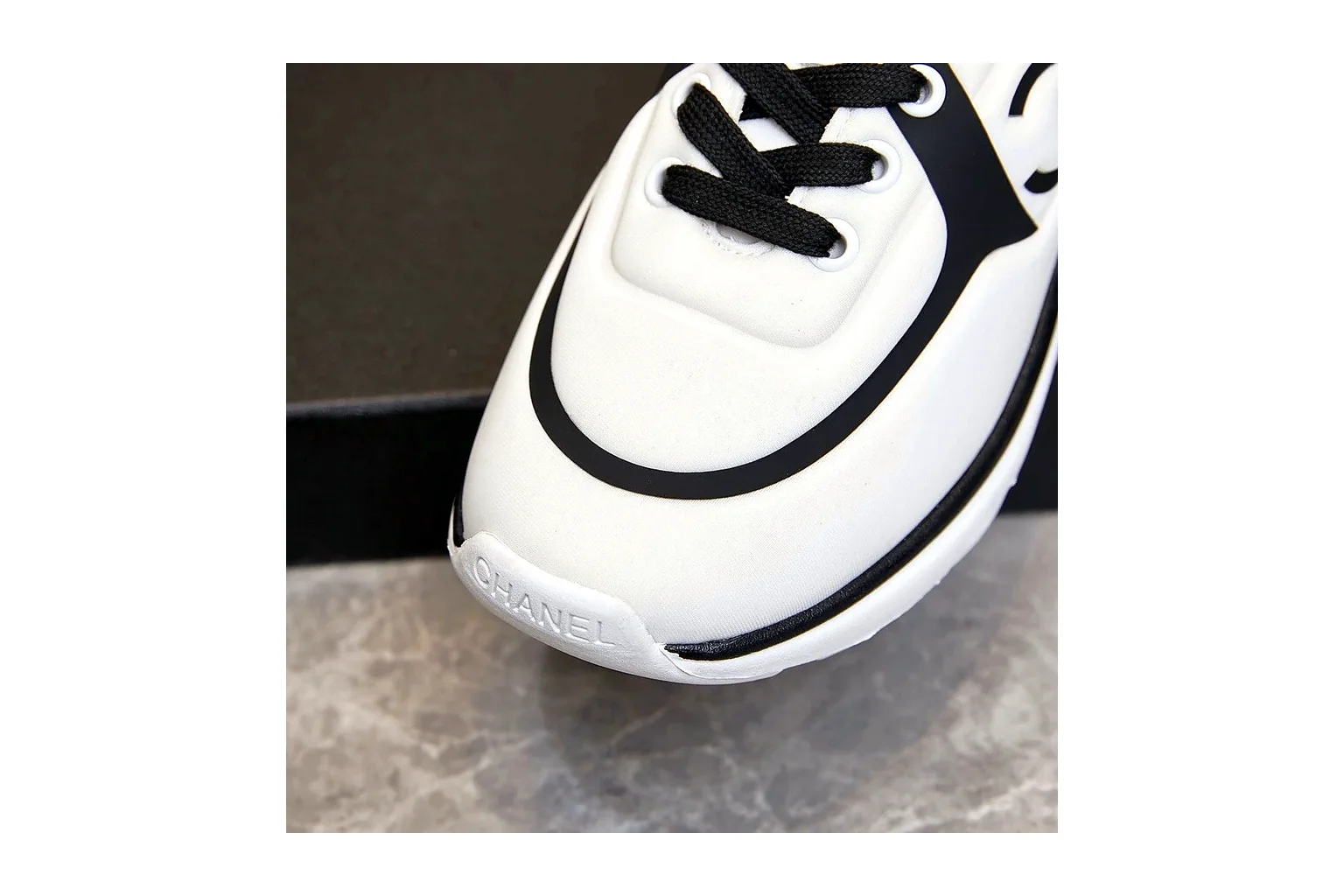 Chanel CC Low Top White Black luxury low top six photo view thumbnail 2