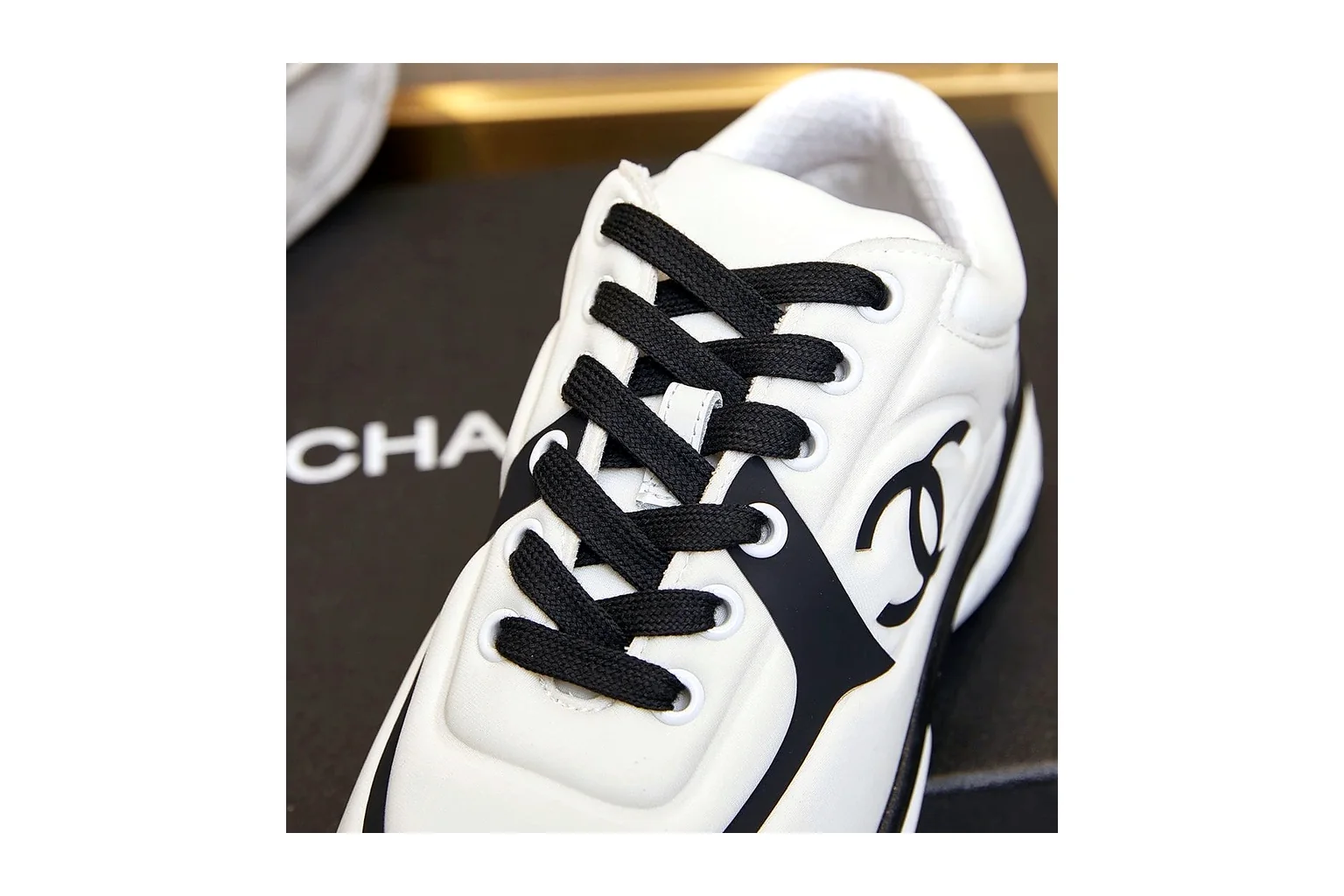 Chanel CC Low Top White Black luxury low top six photo view thumbnail 3