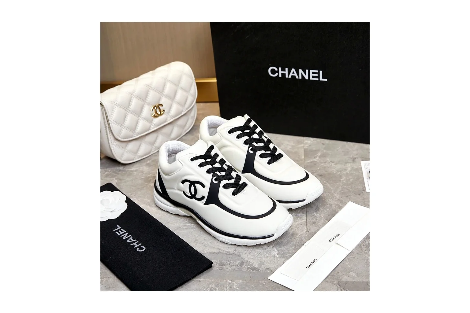 Chanel CC Low Top White Black luxury low top six photo view thumbnail 4