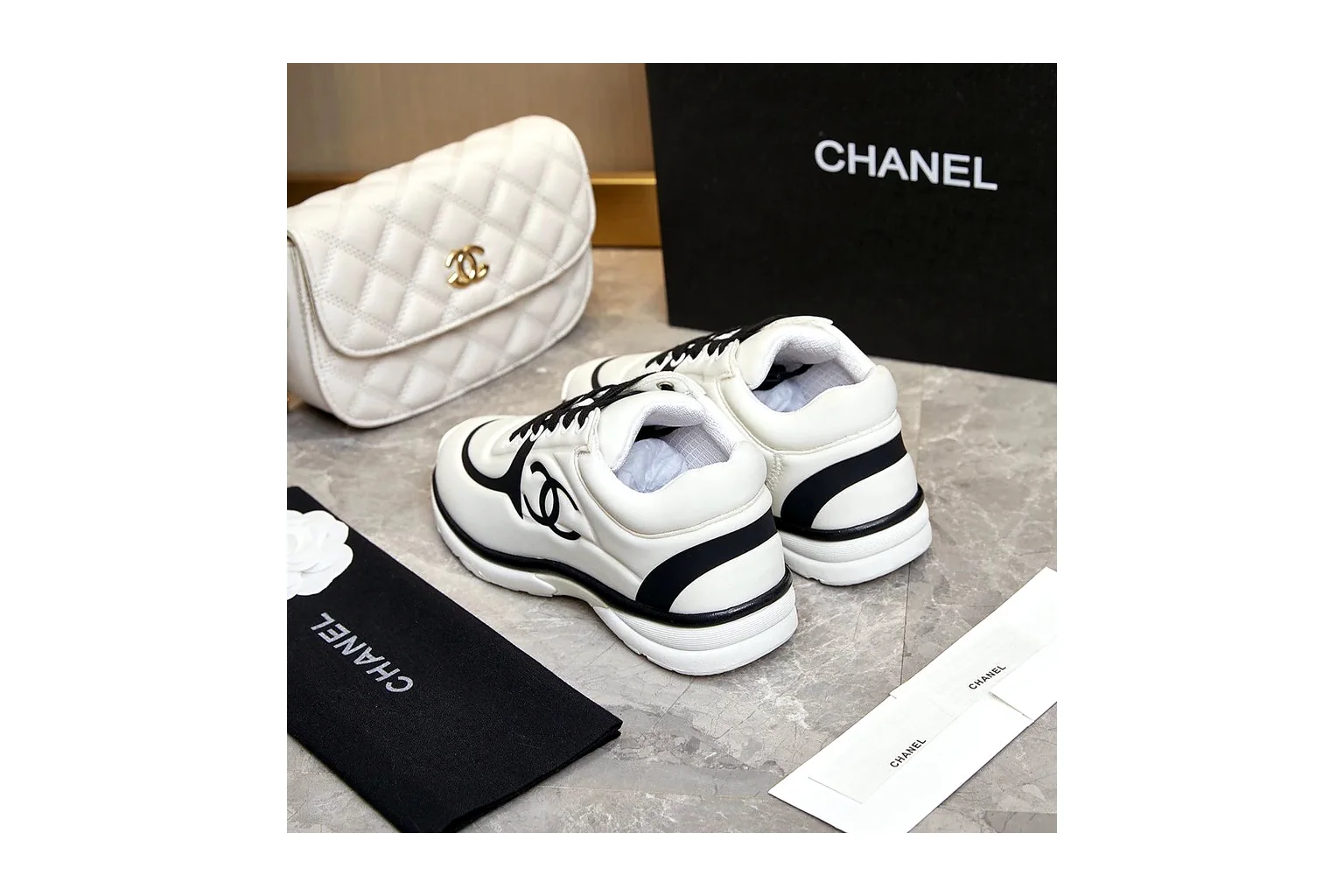 Chanel CC Low Top White Black luxury low top six photo view thumbnail 6