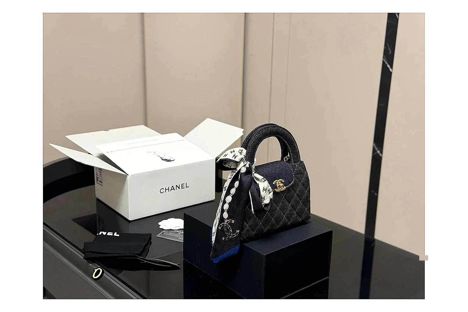 Chanel Quilted Chain Bag Black shopping brief photo showing black quilted leather body, chain strap, flap profile, and polished luxury hardware