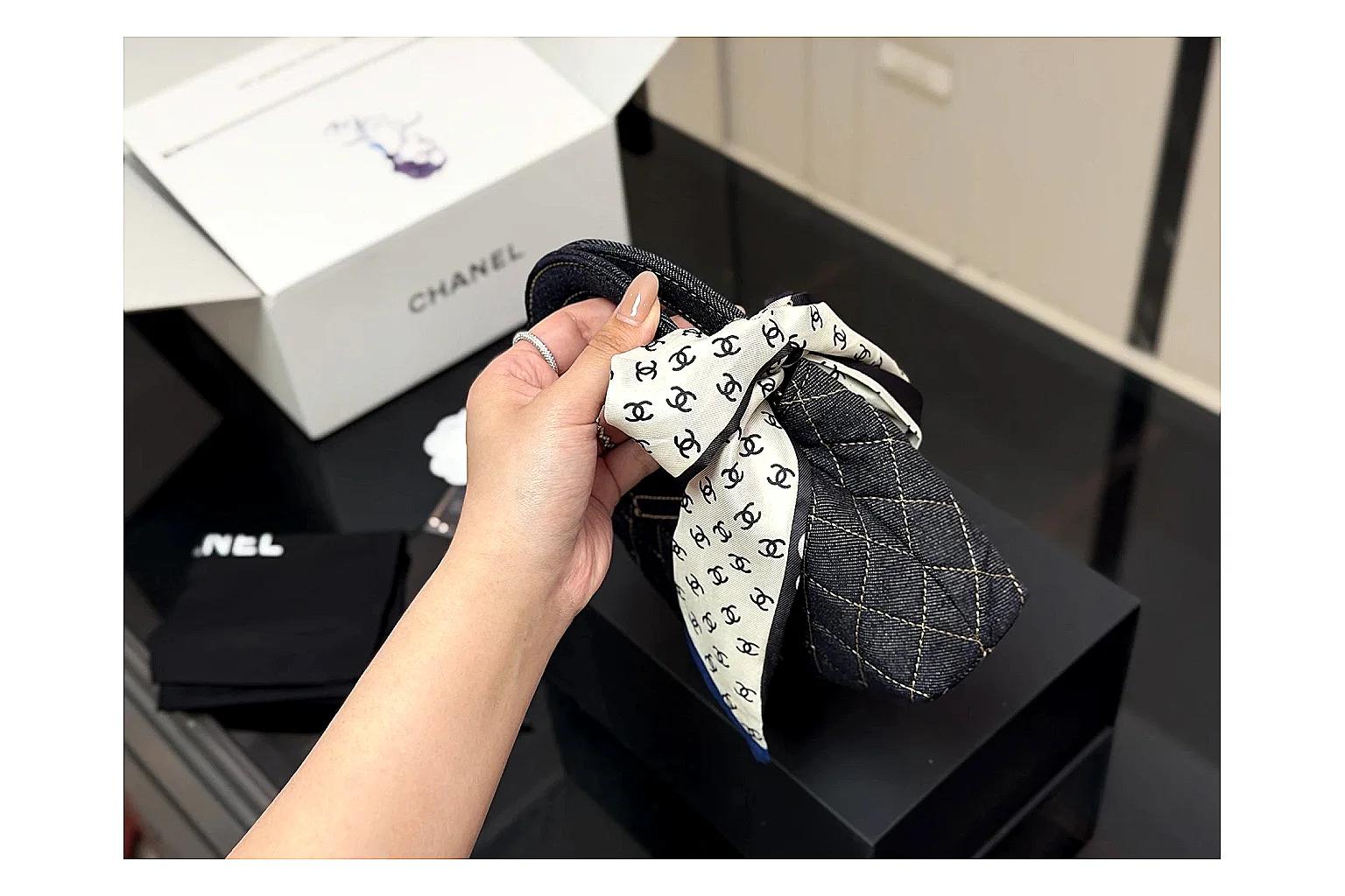 Chanel Quilted Chain Bag Black shopping brief photo showing black quilted leather body, chain strap, flap profile, and polished luxury hardware thumbnail 6