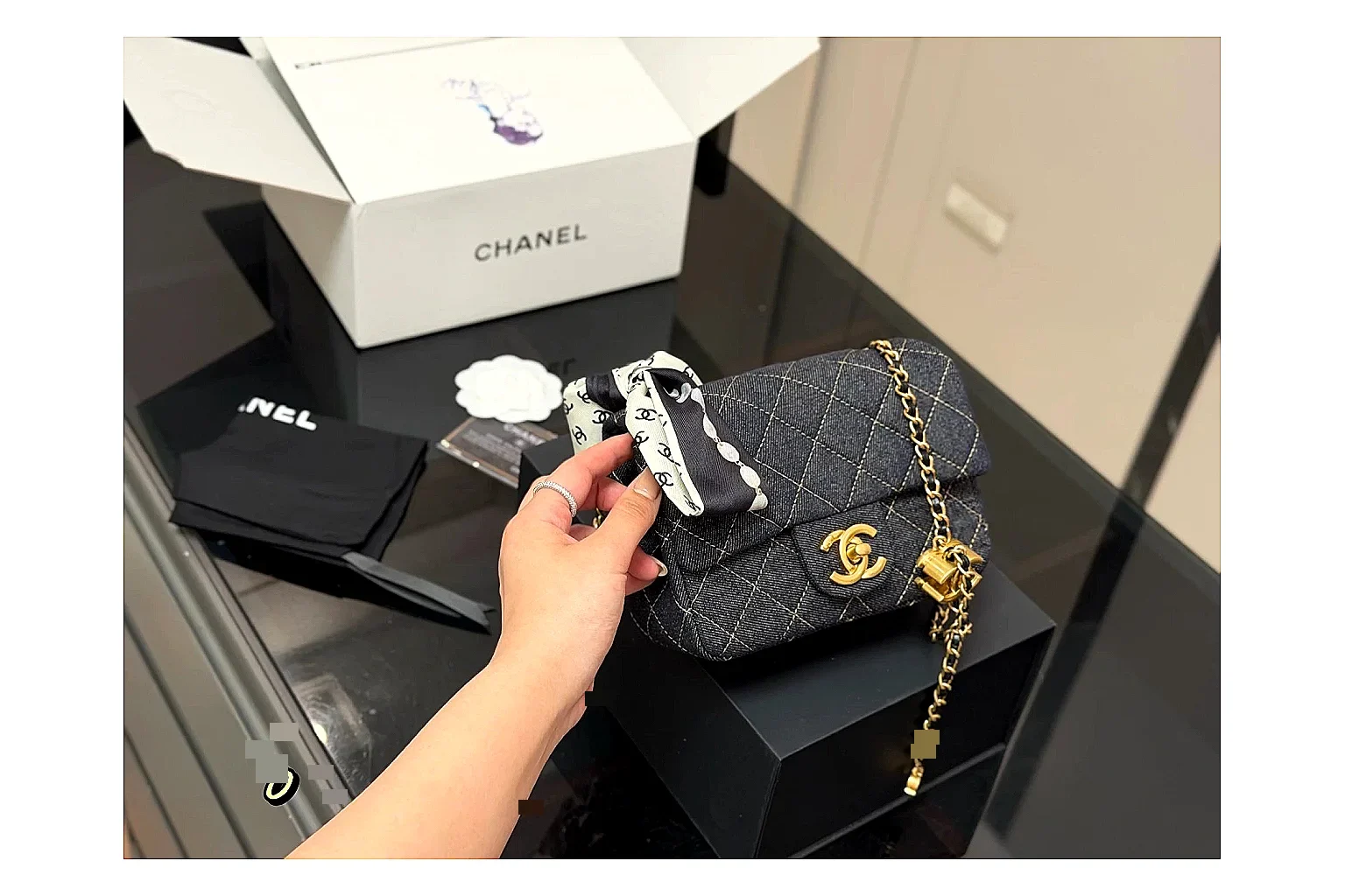 Chanel Quilted Chain Bag Black shopping brief photo showing black quilted leather body, chain shoulder strap, flap structure, and polished hardware