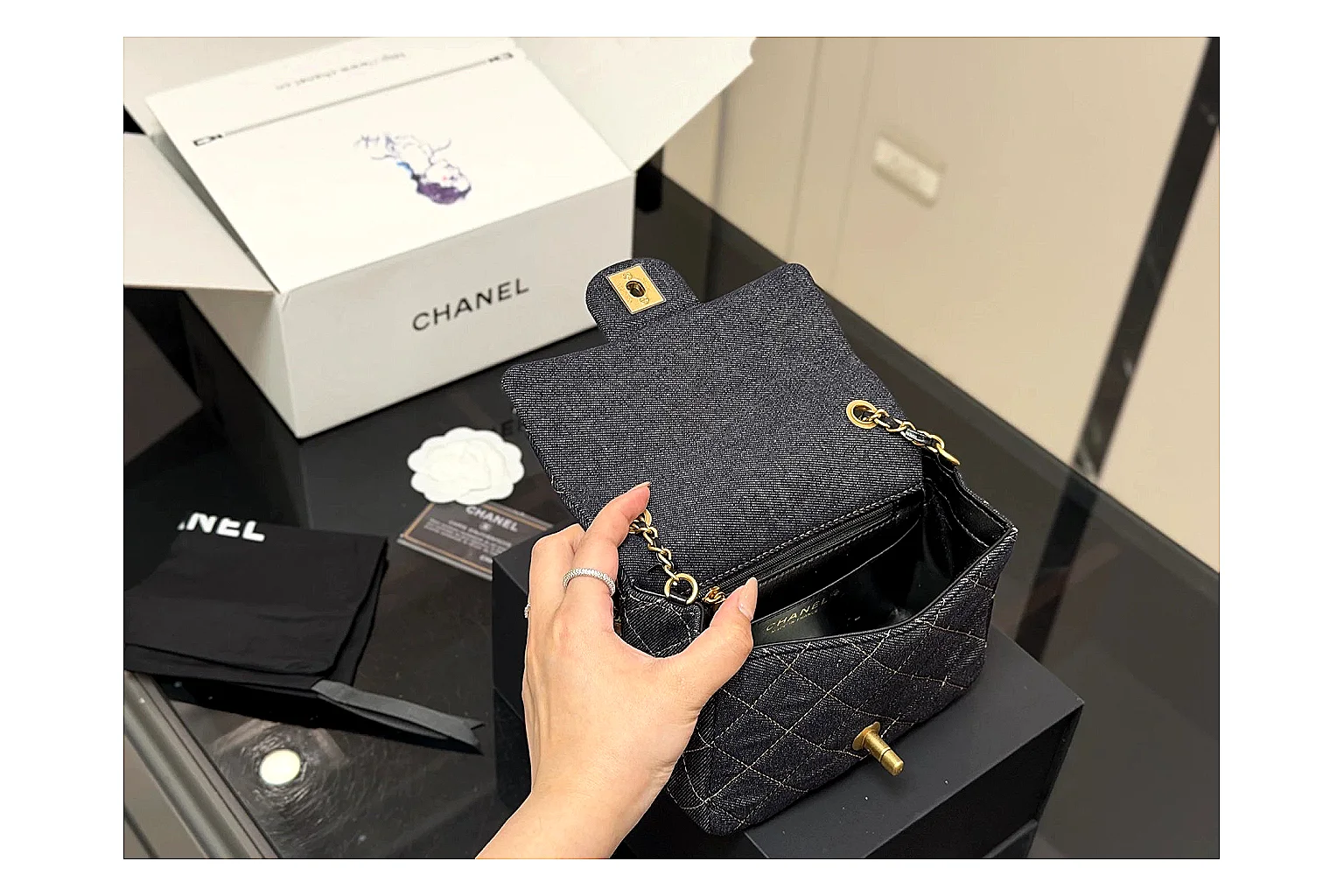 Chanel Quilted Chain Bag Black shopping brief photo showing black quilted leather body, chain shoulder strap, flap structure, and polished hardware thumbnail 2