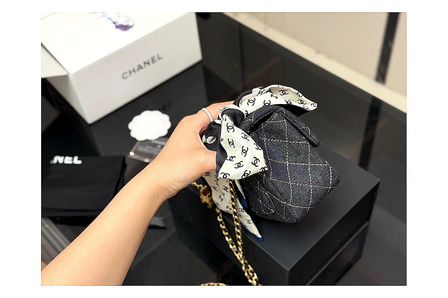 Chanel Quilted Chain Bag Black shopping brief photo showing black quilted leather body, chain shoulder strap, flap structure, and polished hardware thumbnail 6