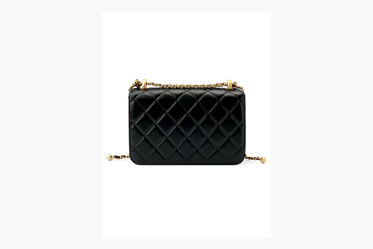 Chanel Black Quilted Chain Flap Bag shopping brief photo showing black quilted leather flap body, gold chain strap, CC front logo, rectangular shoulder-bag shape, and polished hardware thumbnail 3