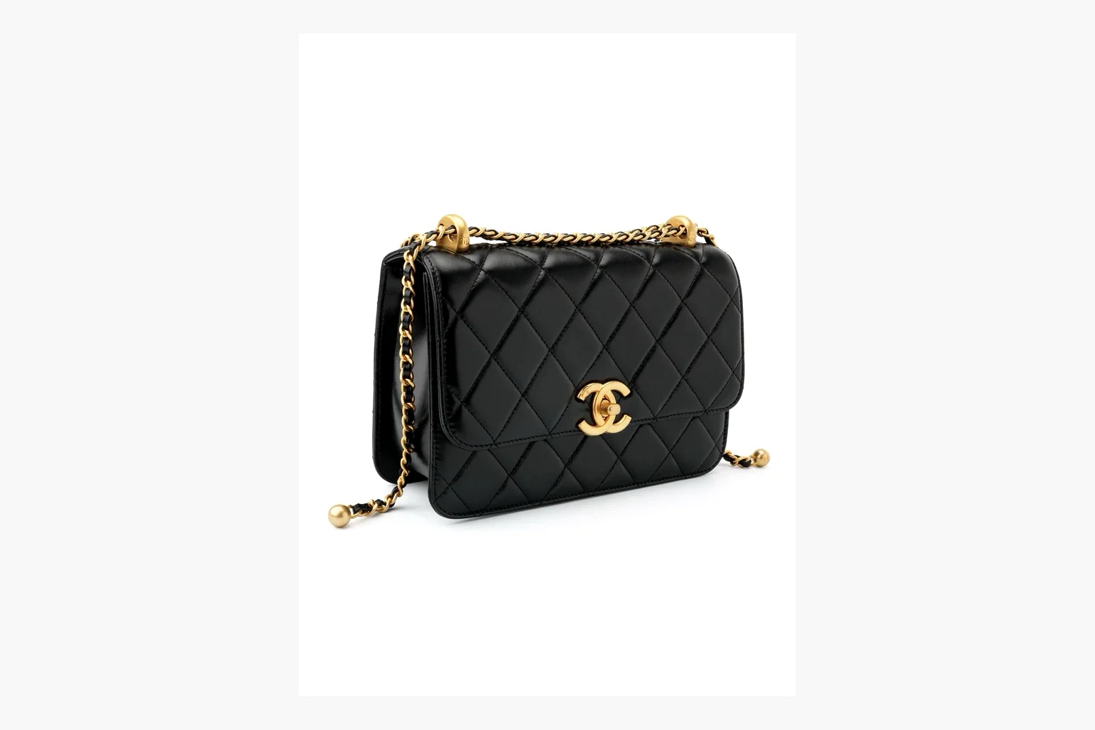 Chanel Black Quilted Chain Flap Bag shopping brief photo showing black quilted leather flap body, gold chain strap, CC front logo, rectangular shoulder-bag shape, and polished hardware thumbnail 4